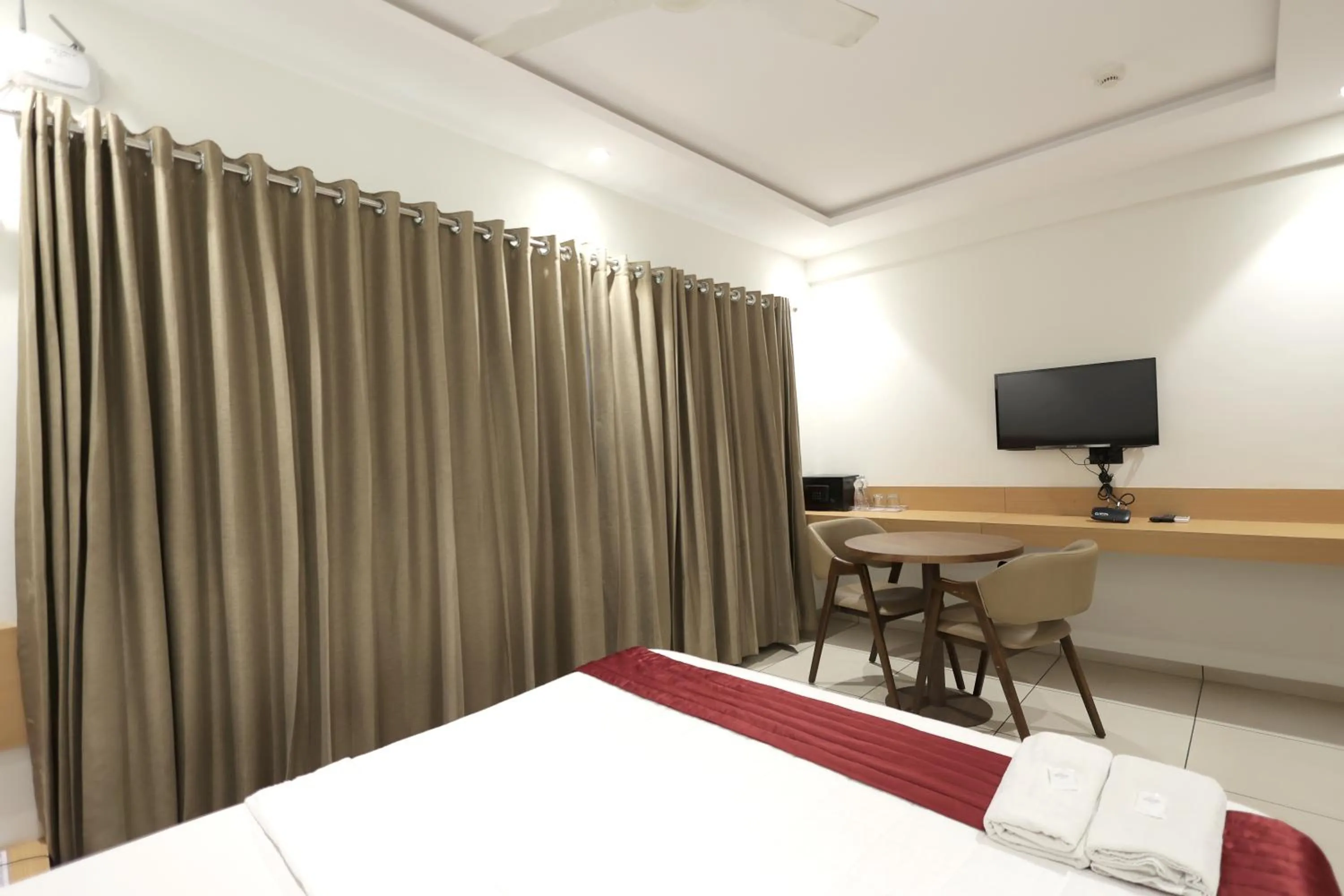 Bedroom, Bed in Hotel Shagun, Piplod City Centre Surat