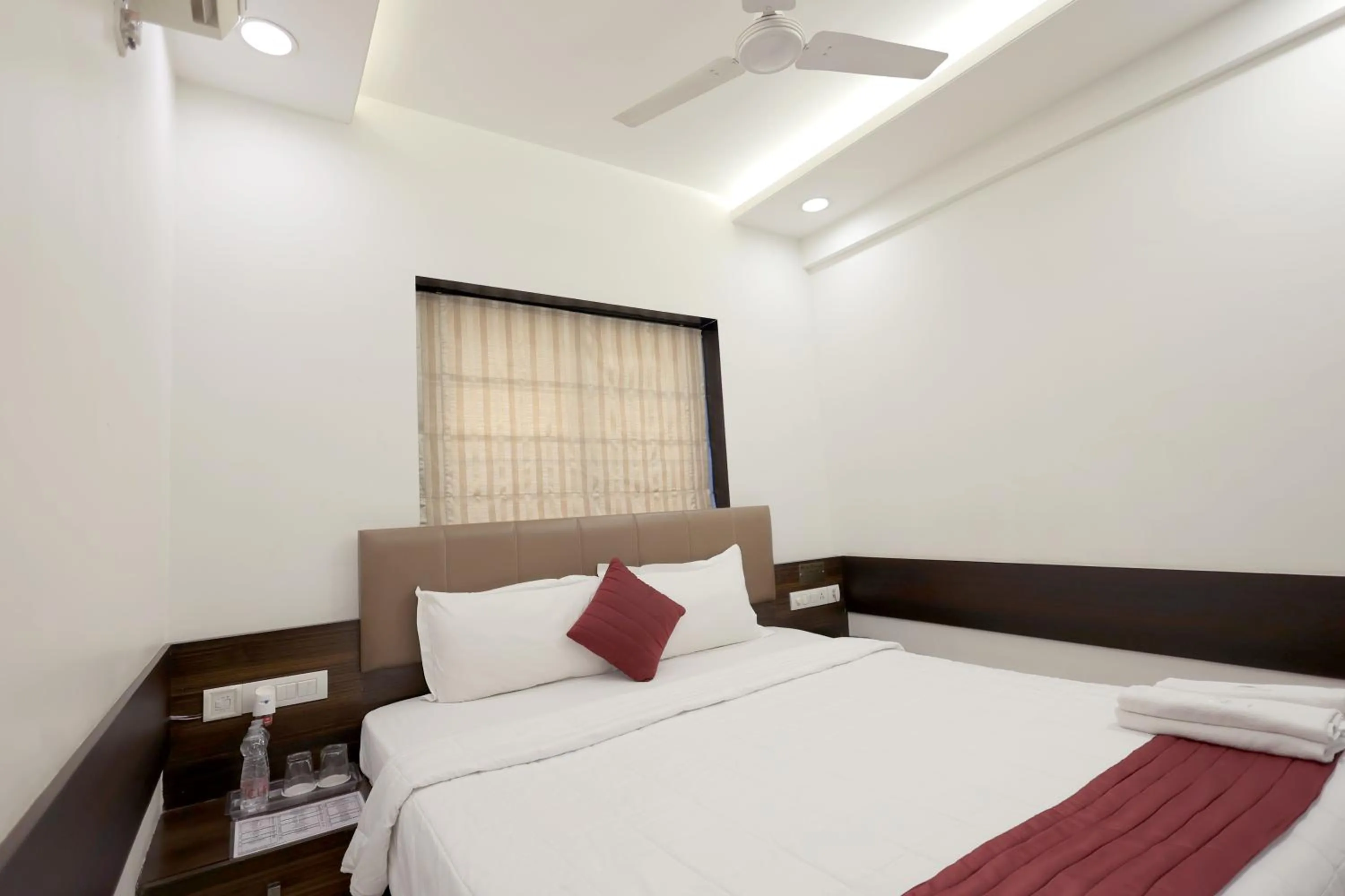 Bedroom, Bed in Hotel Shagun, Piplod City Centre Surat
