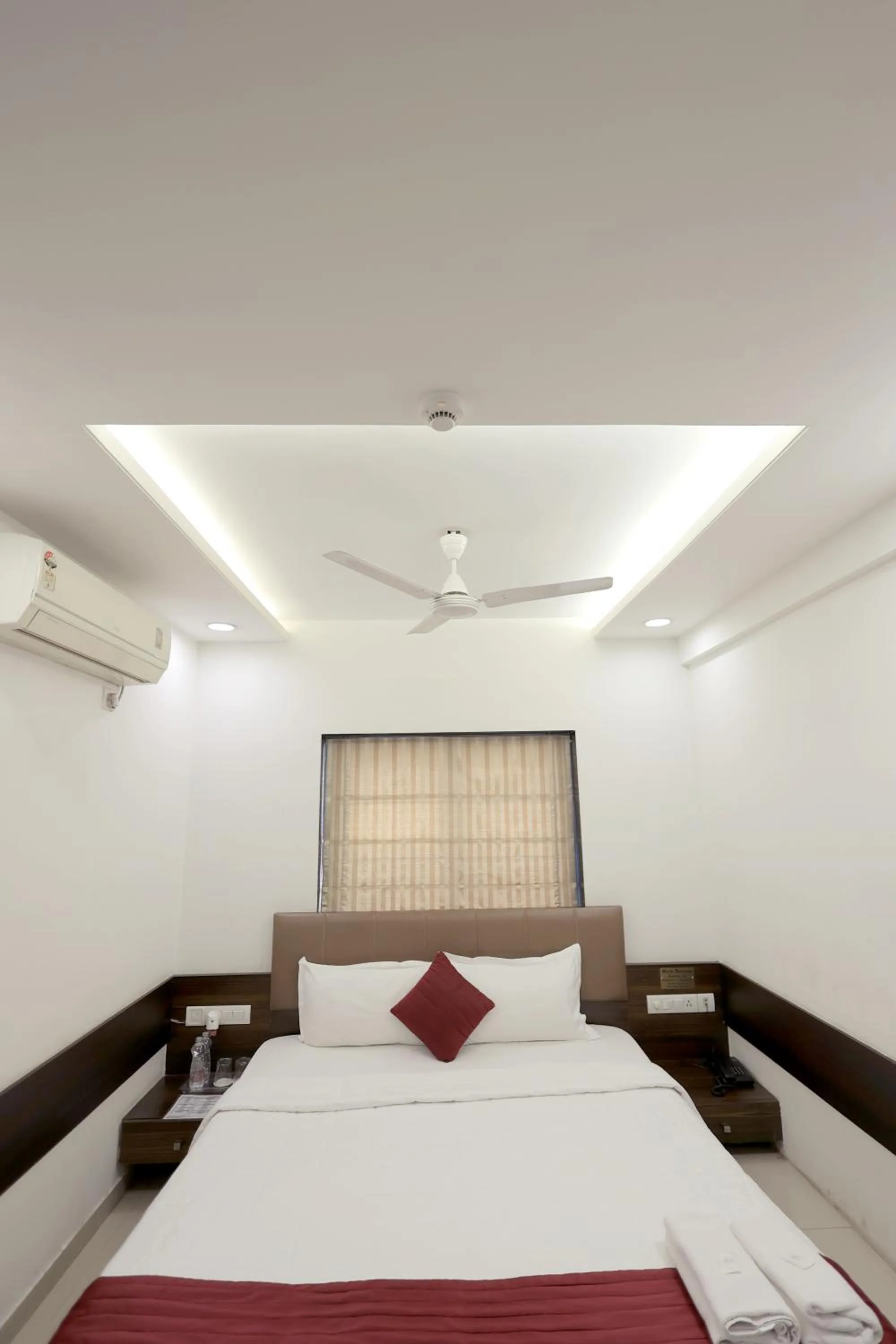 Bedroom, Bed in Hotel Shagun, Piplod City Centre Surat