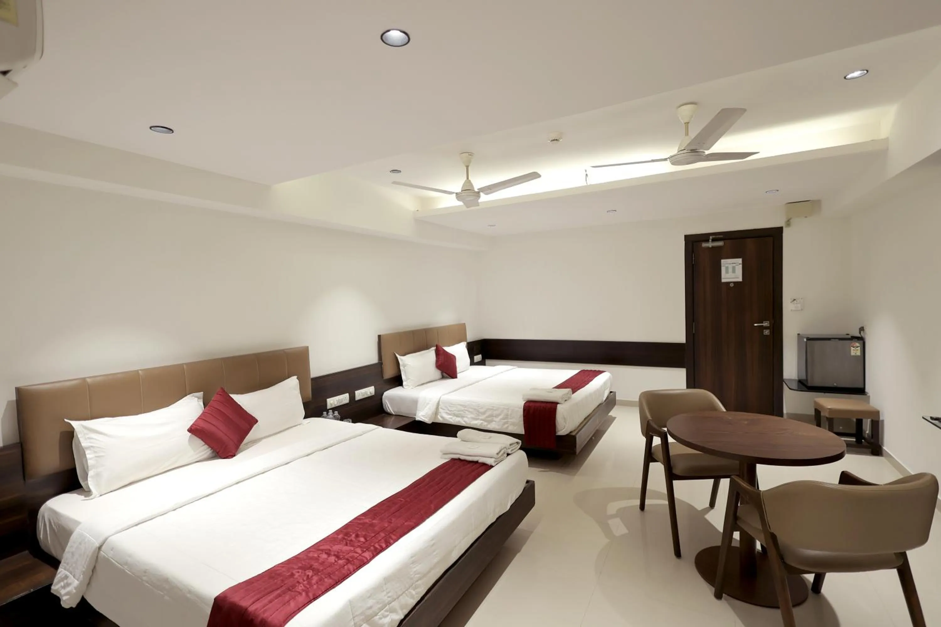 Bedroom, Bed in Hotel Shagun, Piplod City Centre Surat
