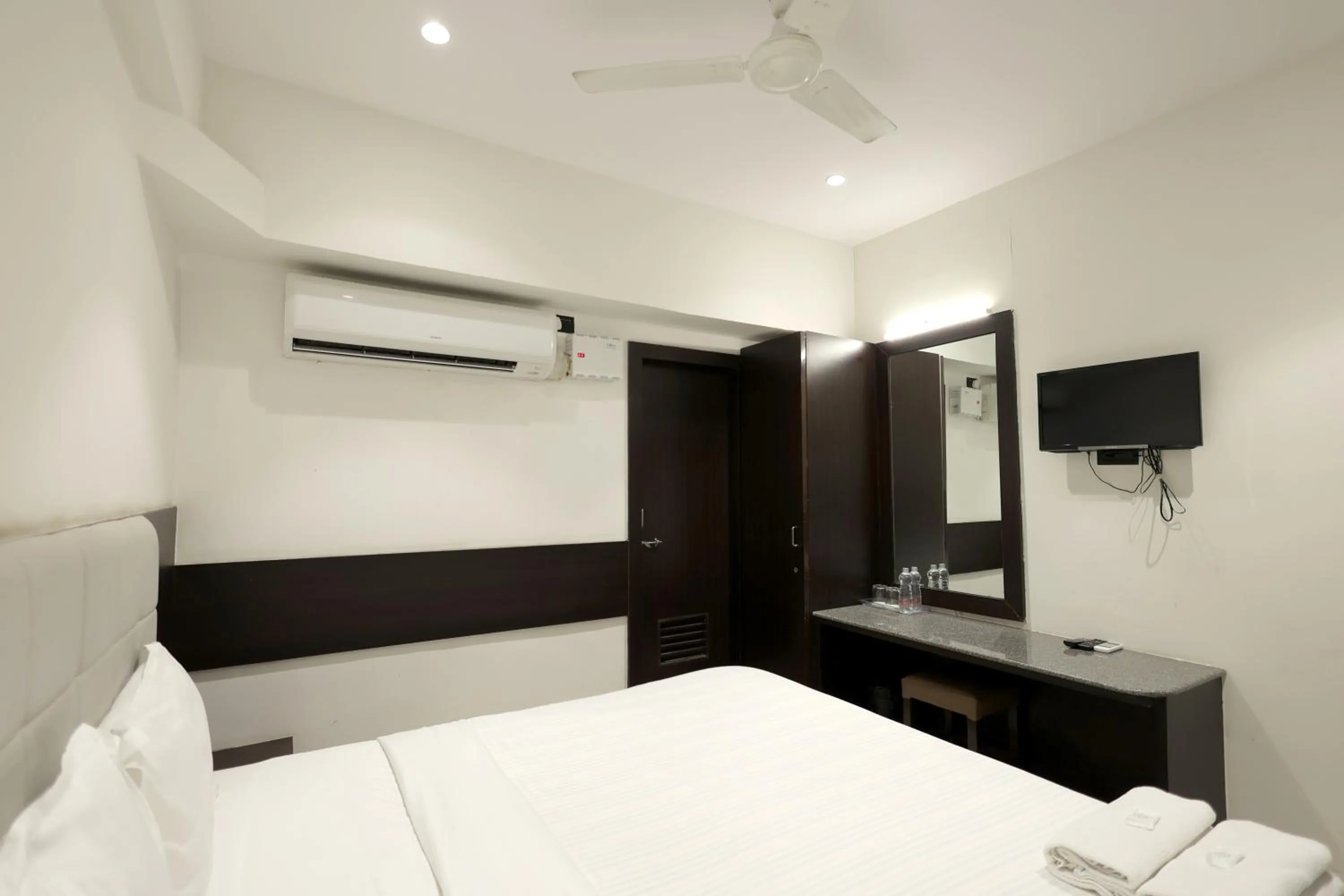Bedroom, Bed in Hotel Shagun, Piplod City Centre Surat
