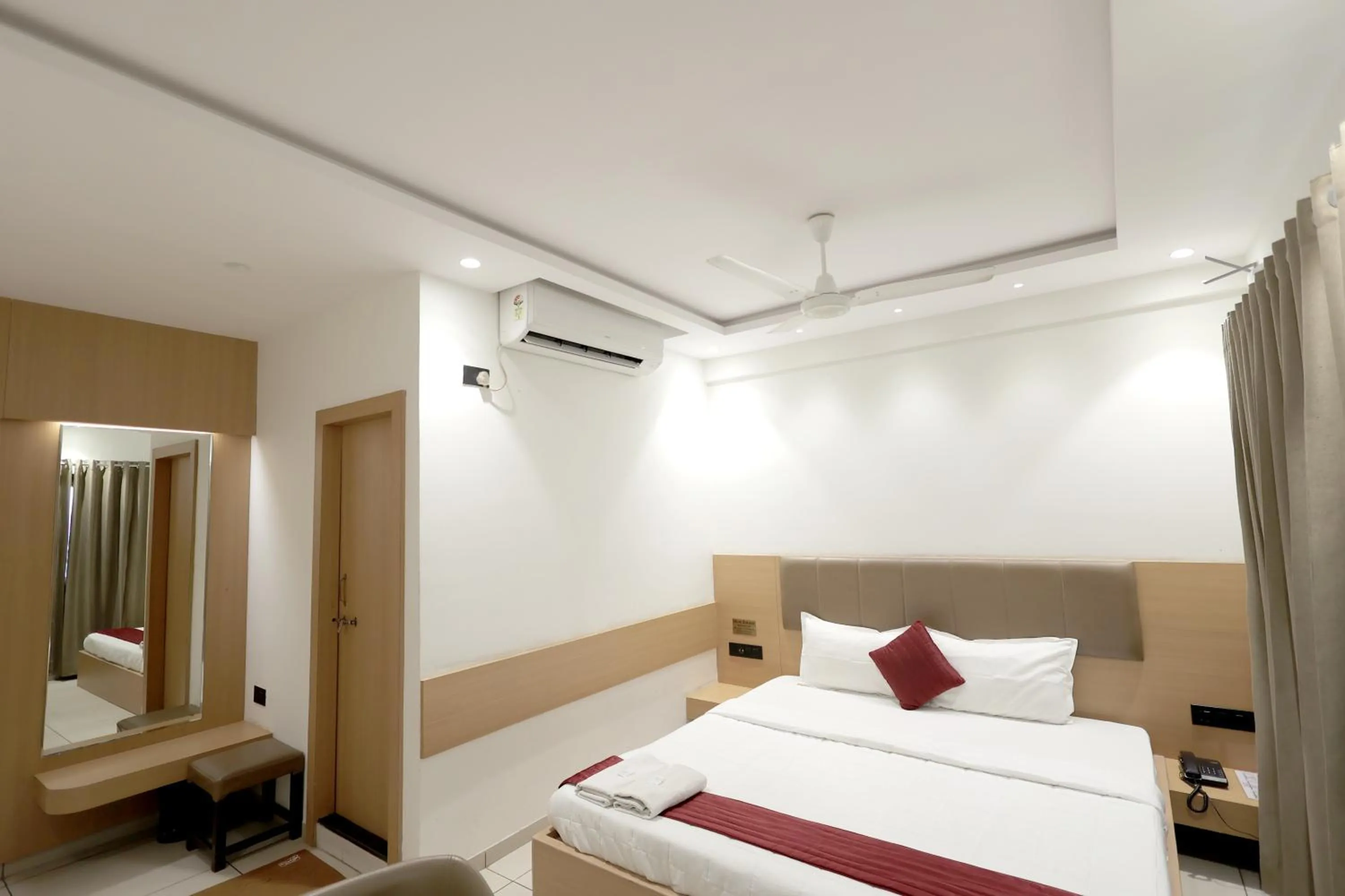 Bedroom, Bed in Hotel Shagun, Piplod City Centre Surat