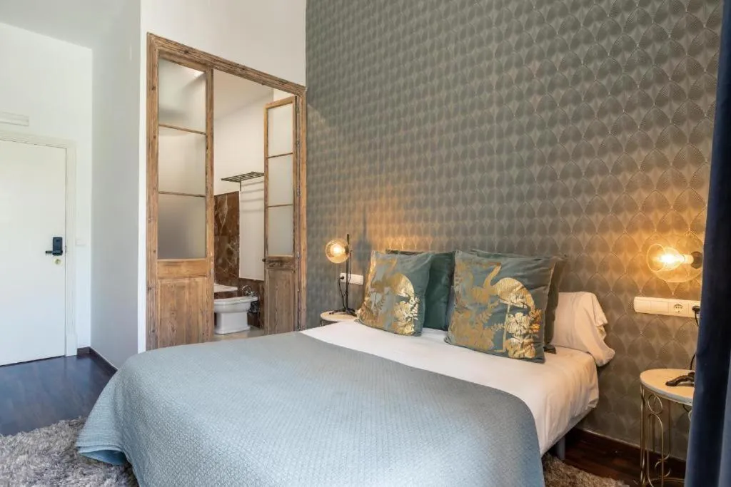 Bed in Catedral Suites Jerez