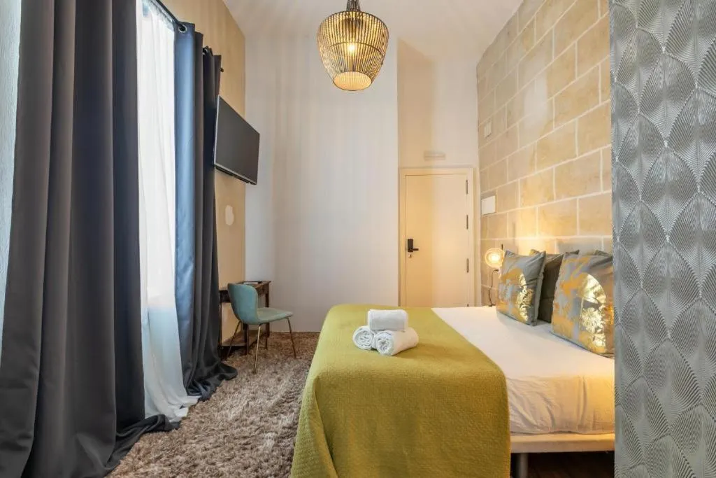 Bed in Catedral Suites Jerez