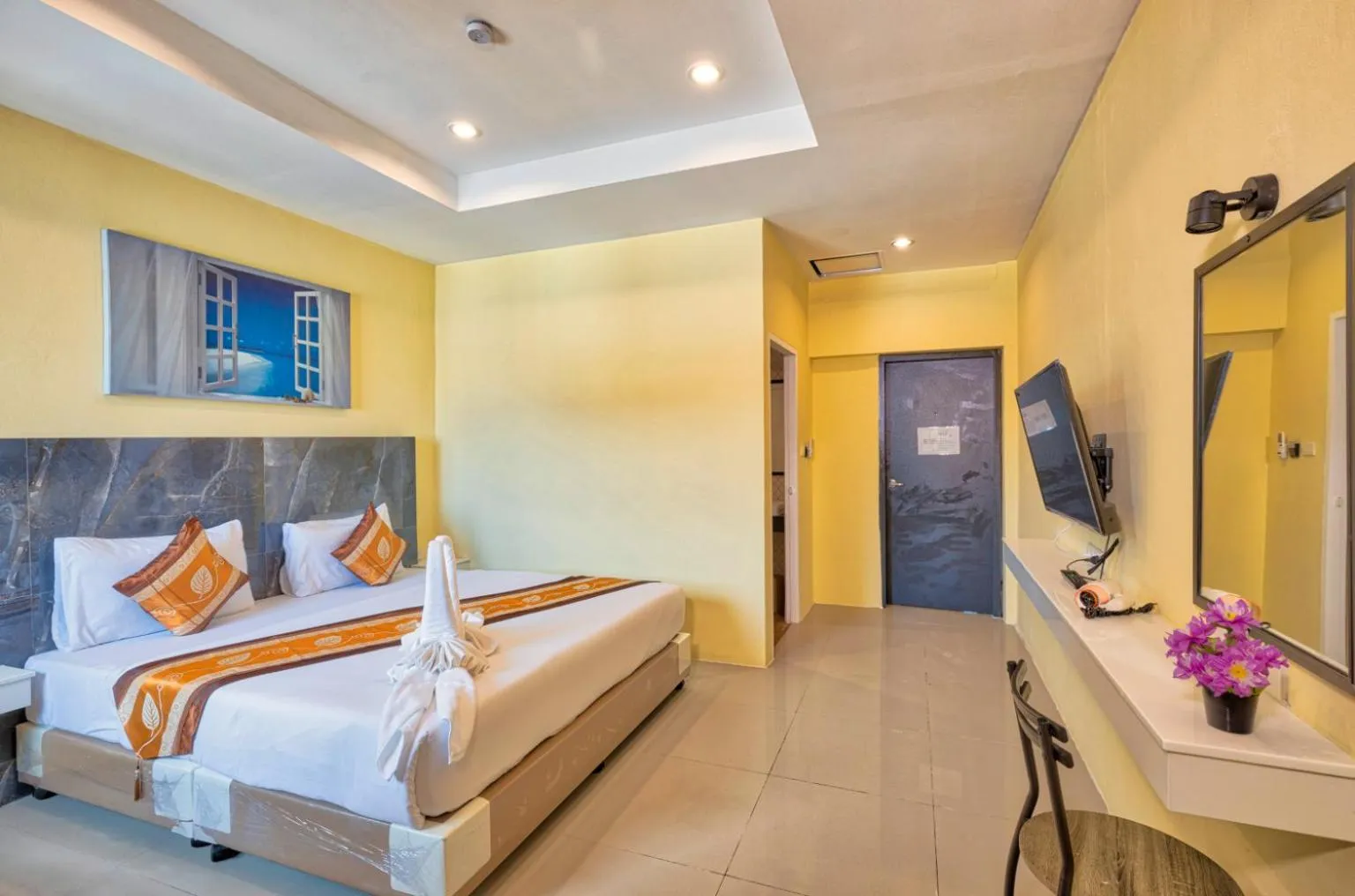 TV and multimedia, Bed in TJ Patong Hotel - SHA Plus