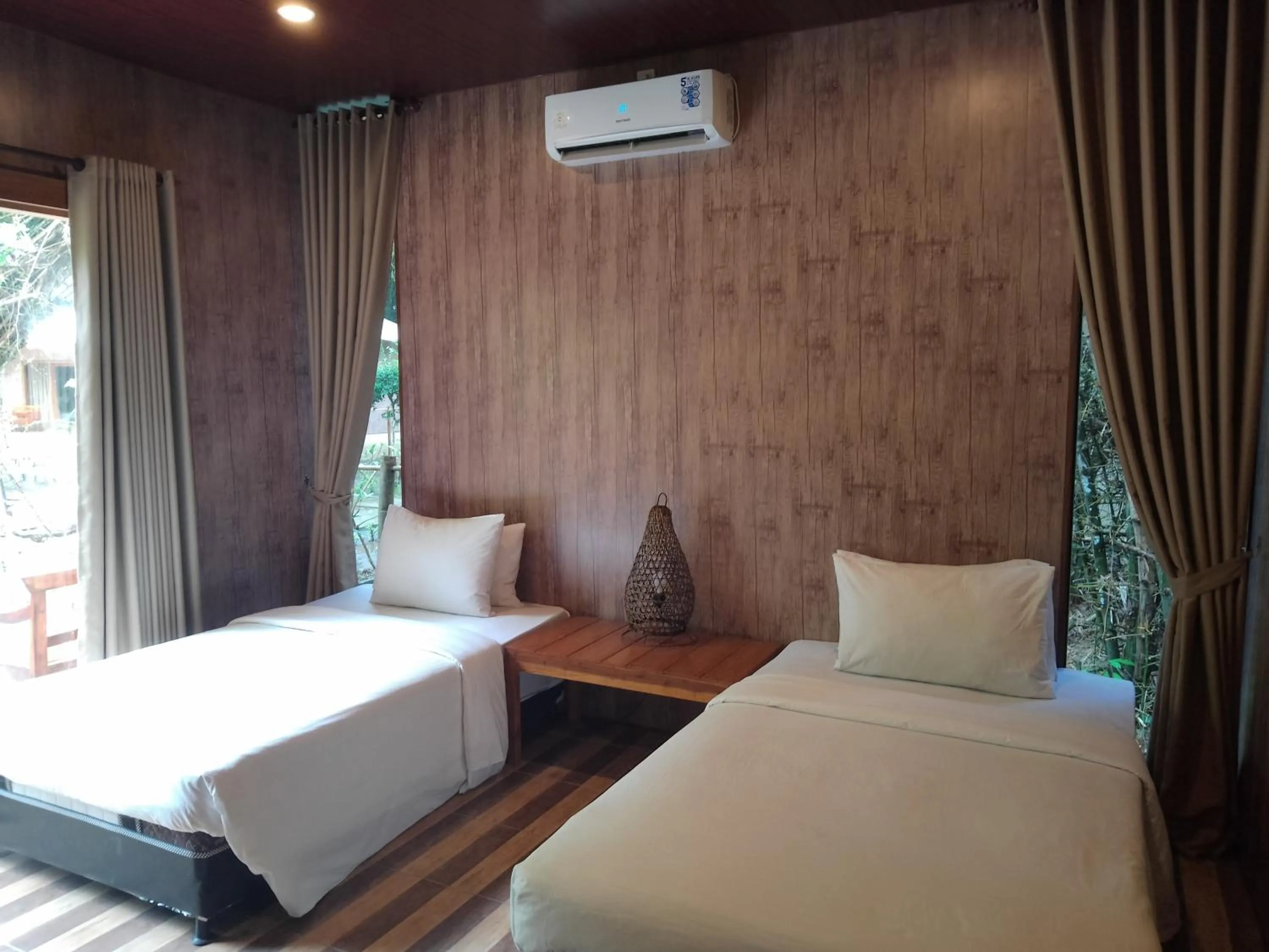 Bed in Jawa Jiwa G-Land Resort
