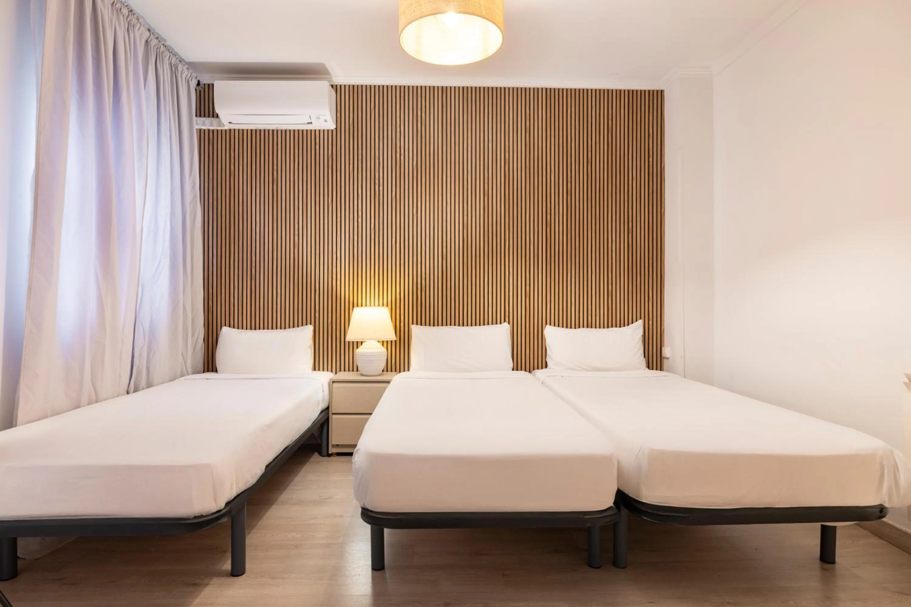 Bedroom, Bed in H-A San Mateo Suites