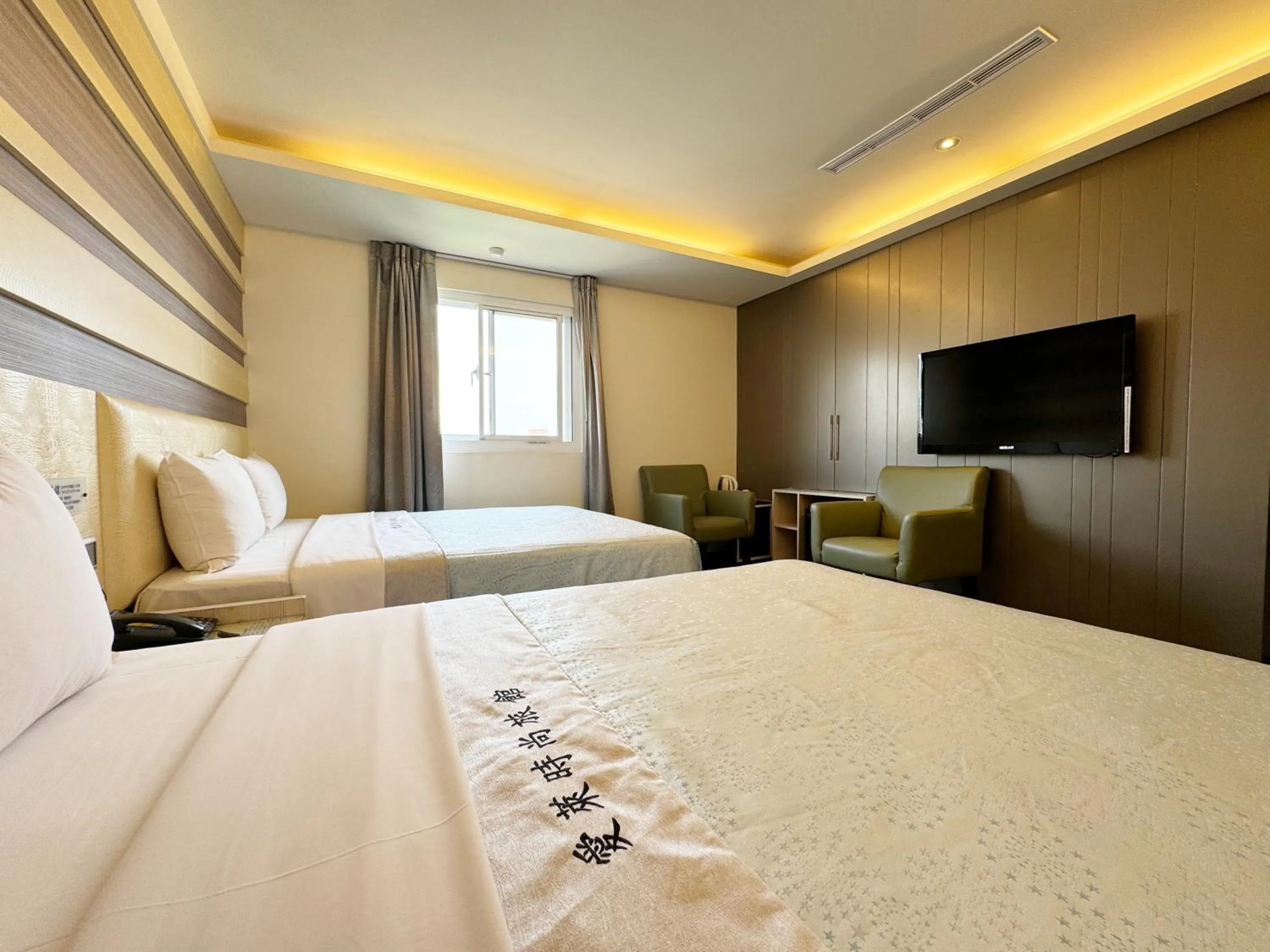 Bed in Ai Lai Fashion Hotel