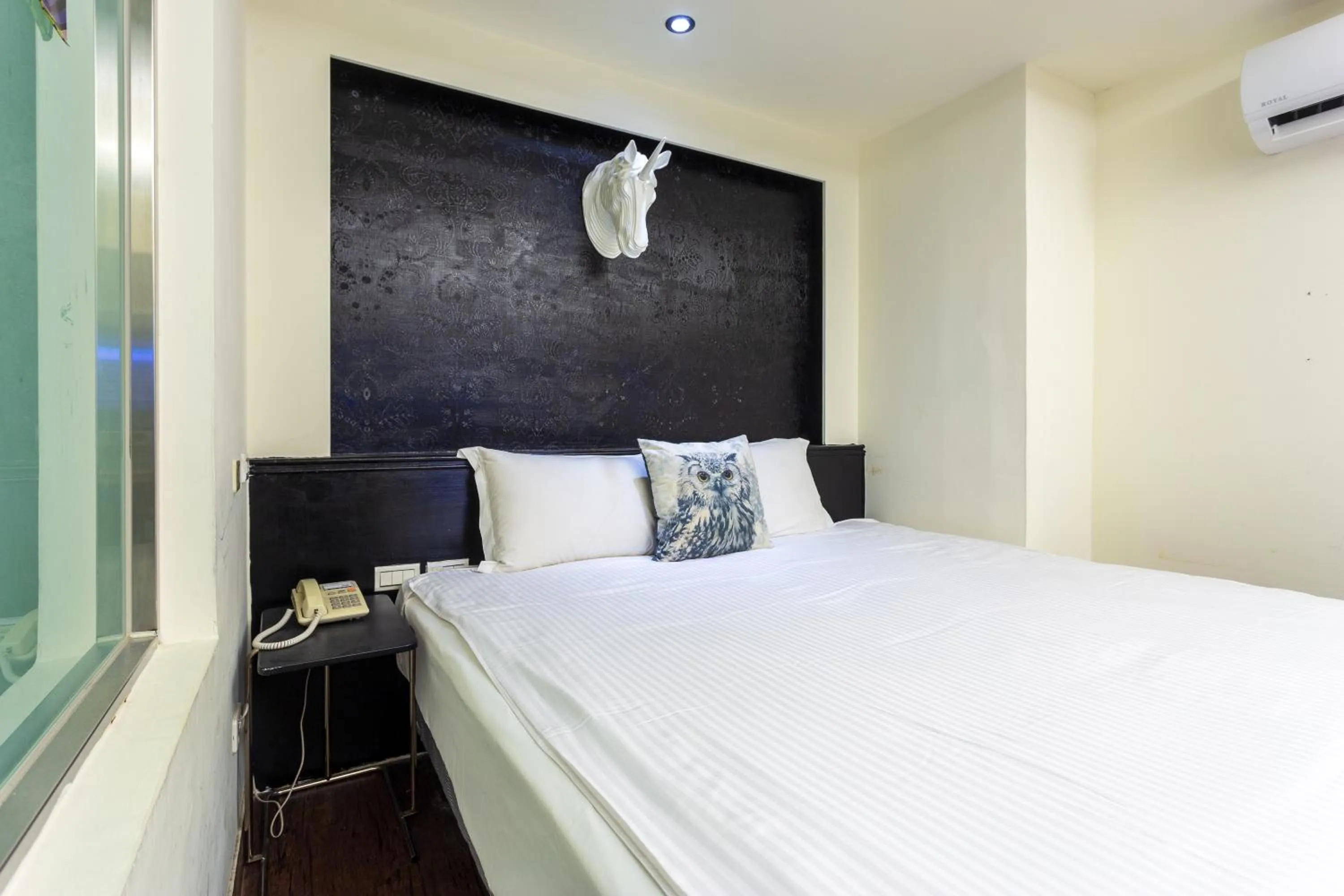 Bed in Newrise Hotel