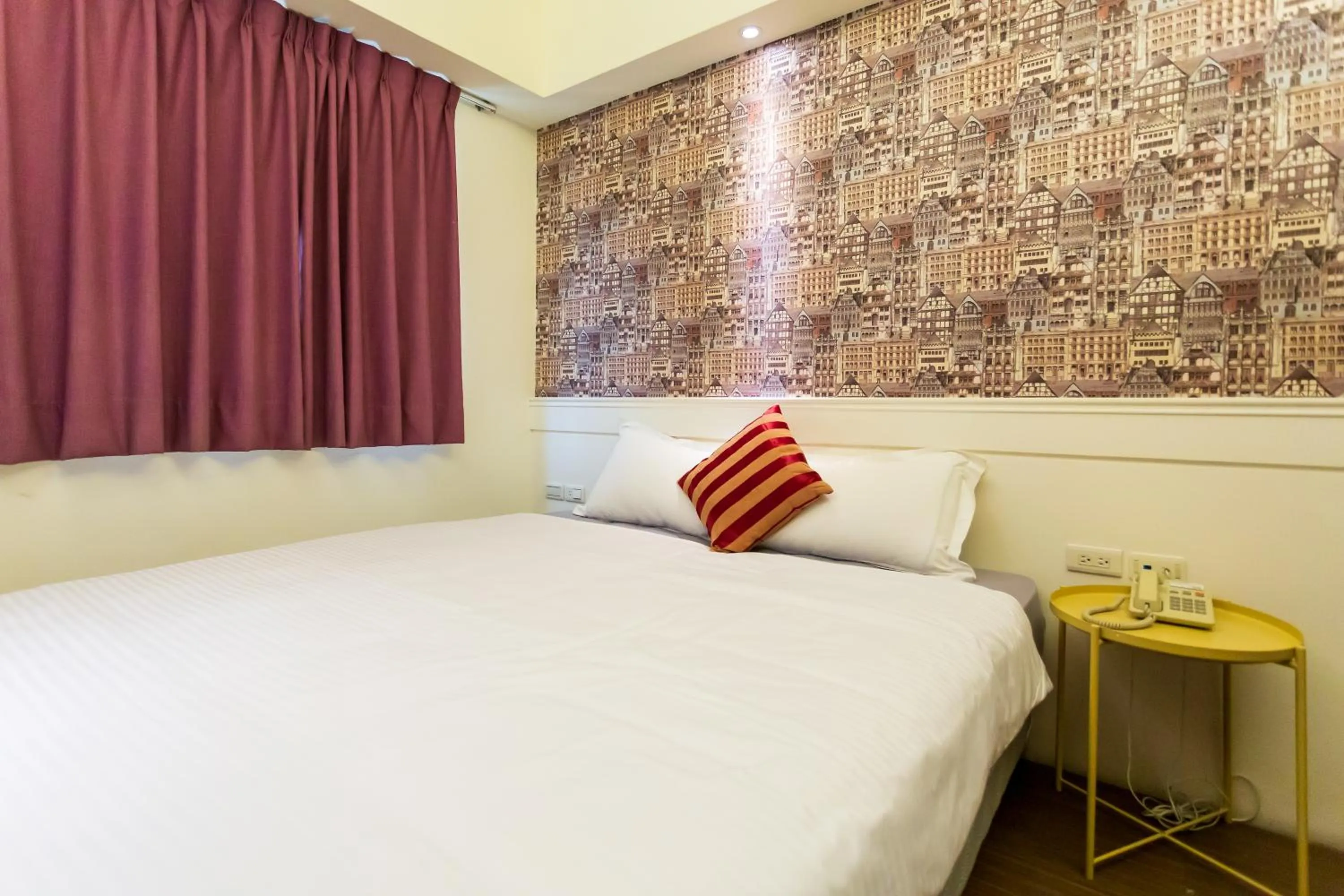 Bed in Newrise Hotel