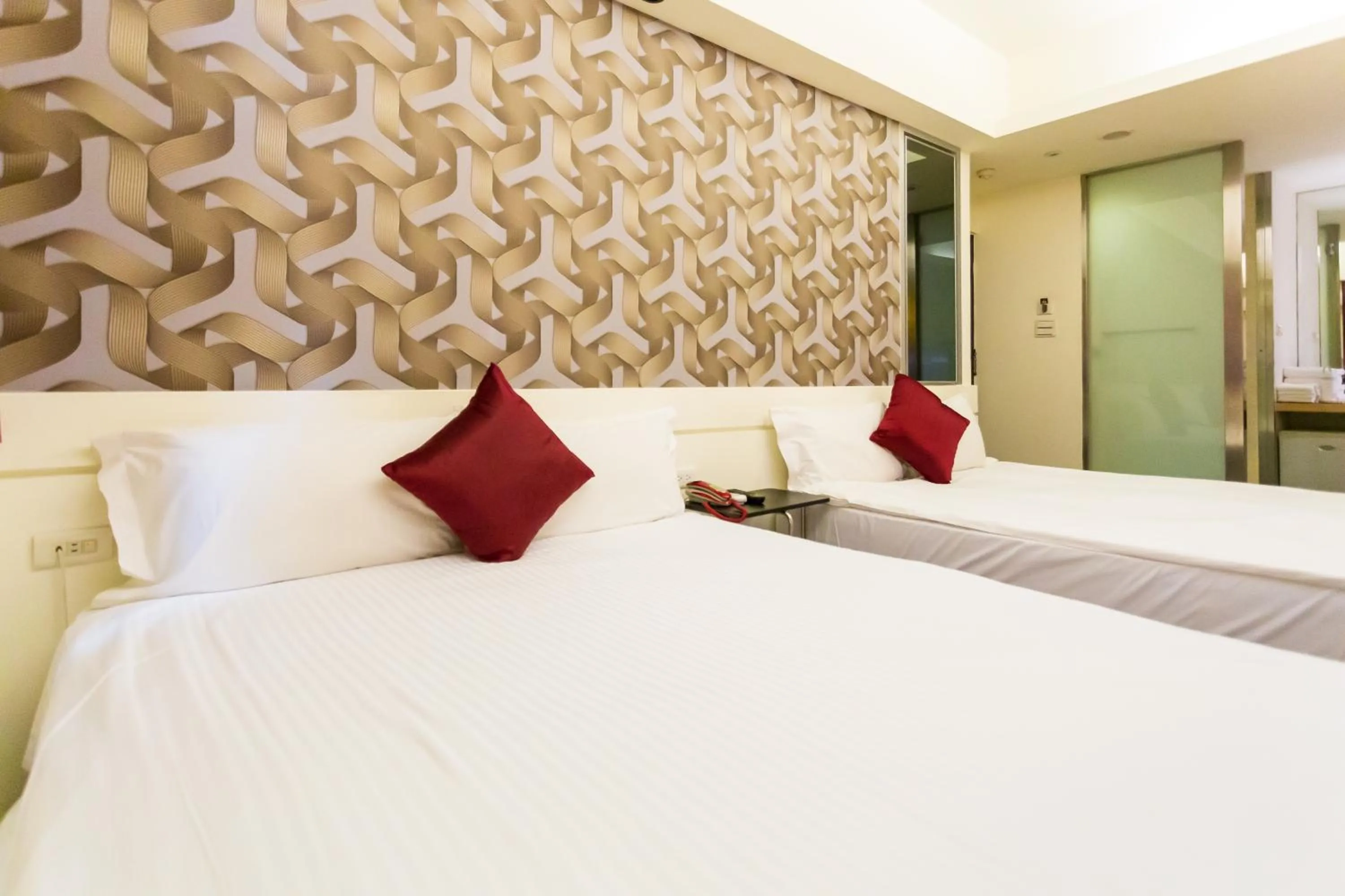 Bed in Newrise Hotel