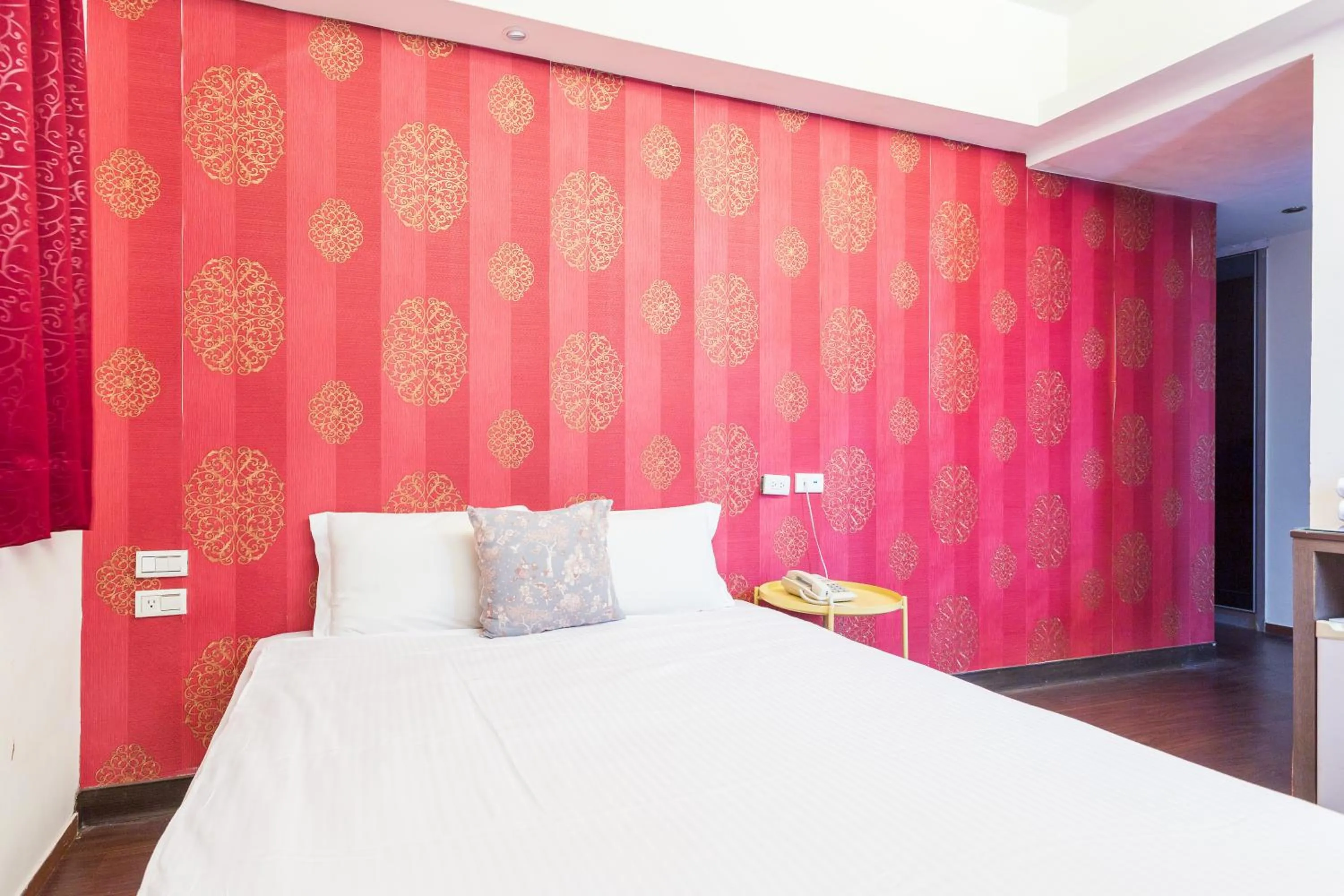 Bed in Newrise Hotel