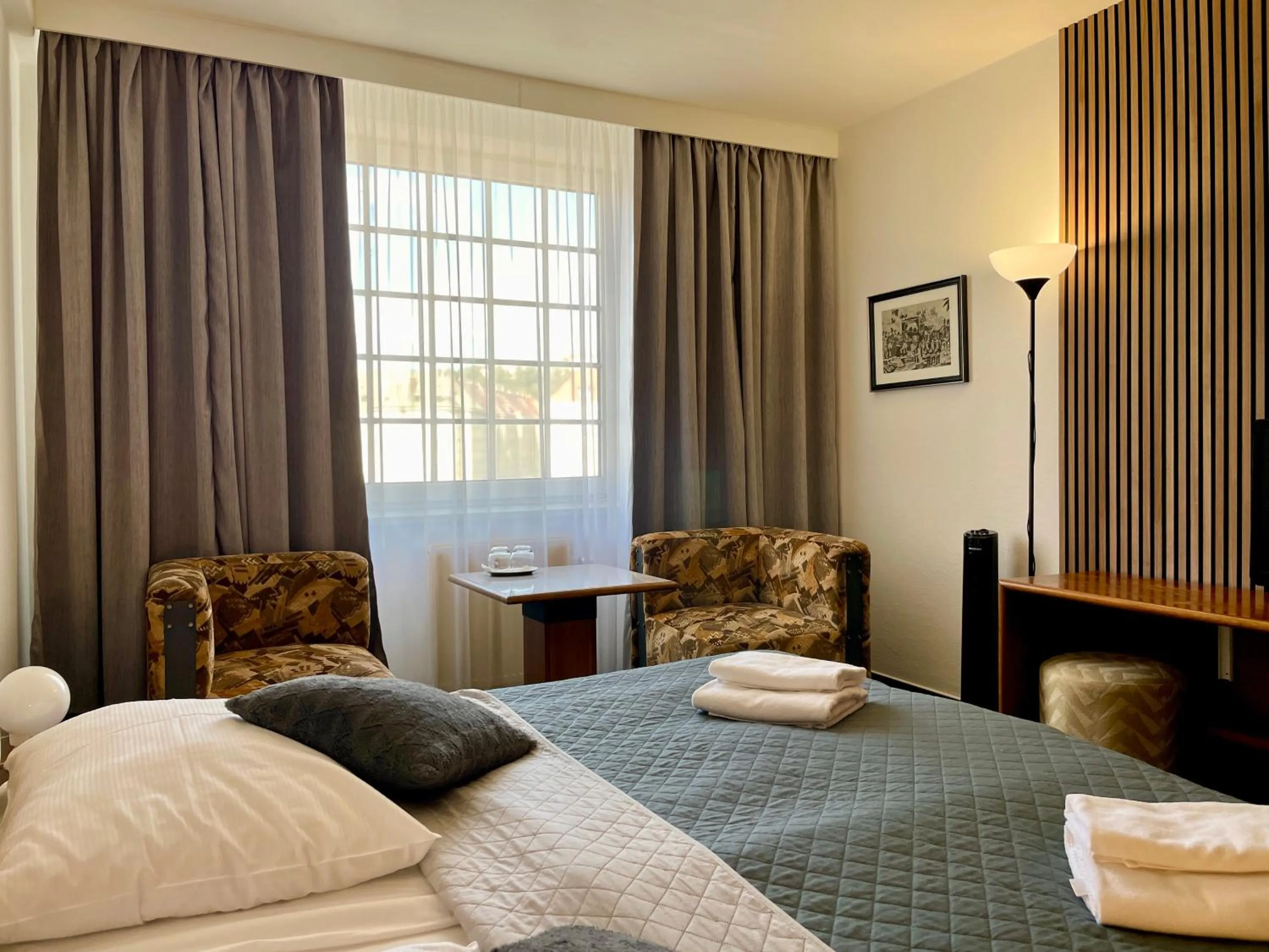 Seating area, Bed in A-Austerlitz Hotel