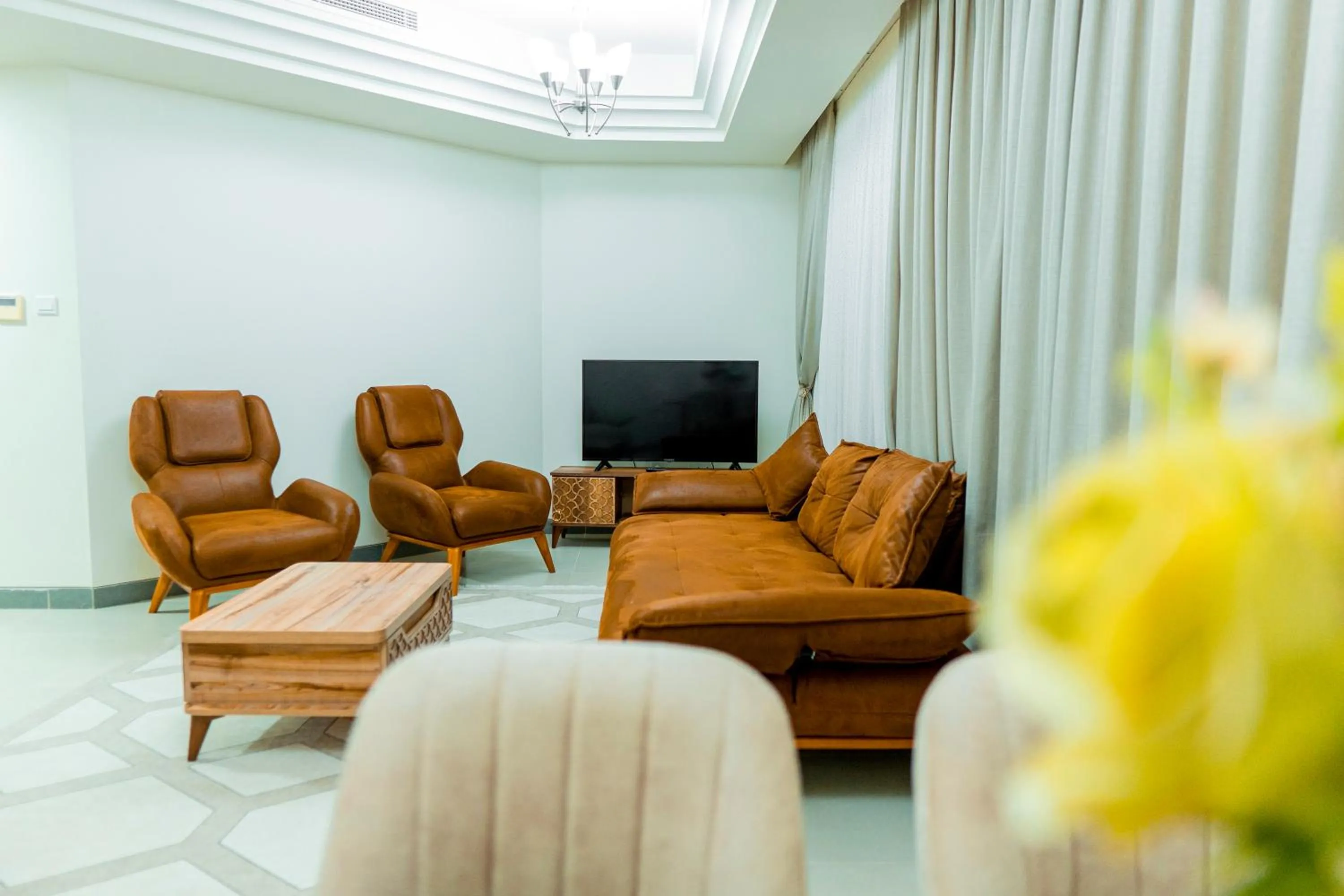 Communal lounge/ TV room in Niamey Mall & Residence