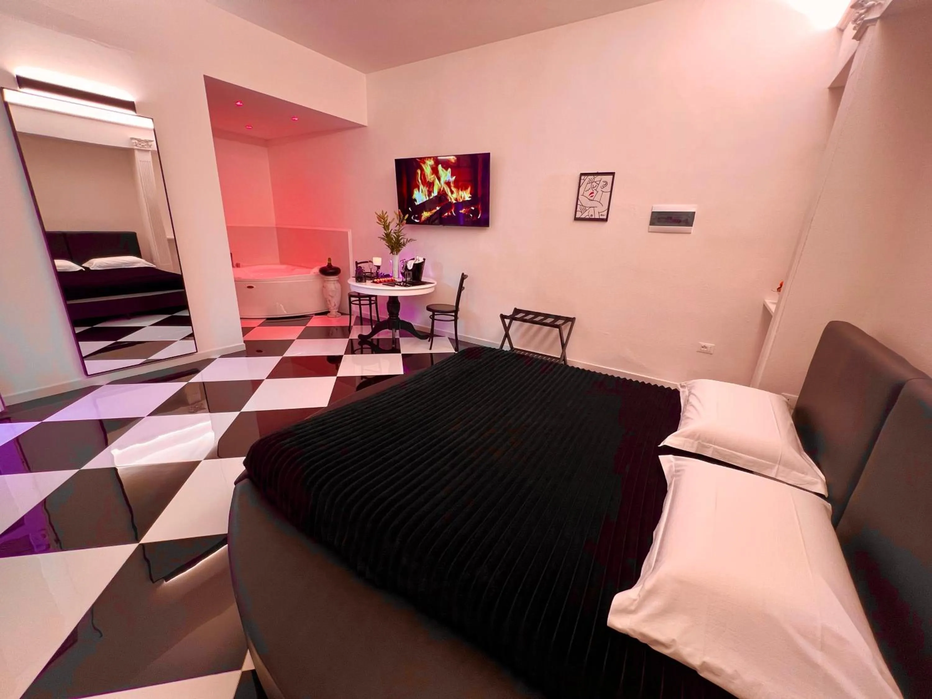 Bed in Alchimia Luxury Suites