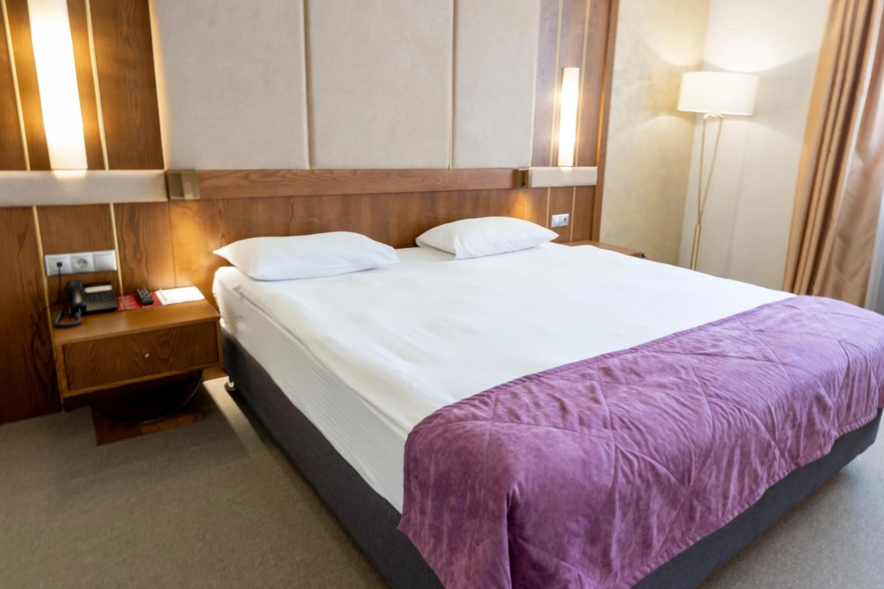 Bed in Reikartz Sky Almaty