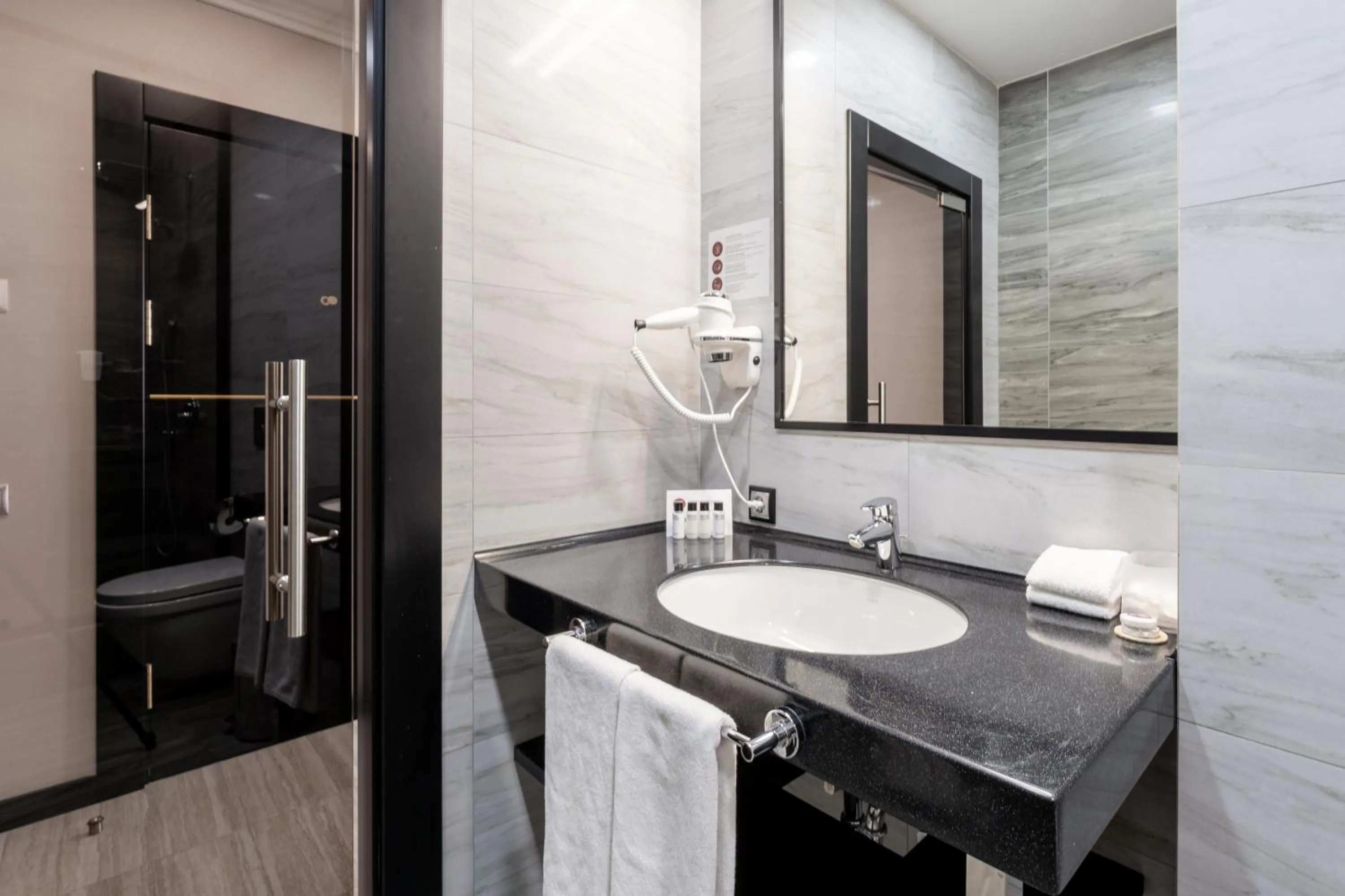 Bathroom in Reikartz Sky Almaty