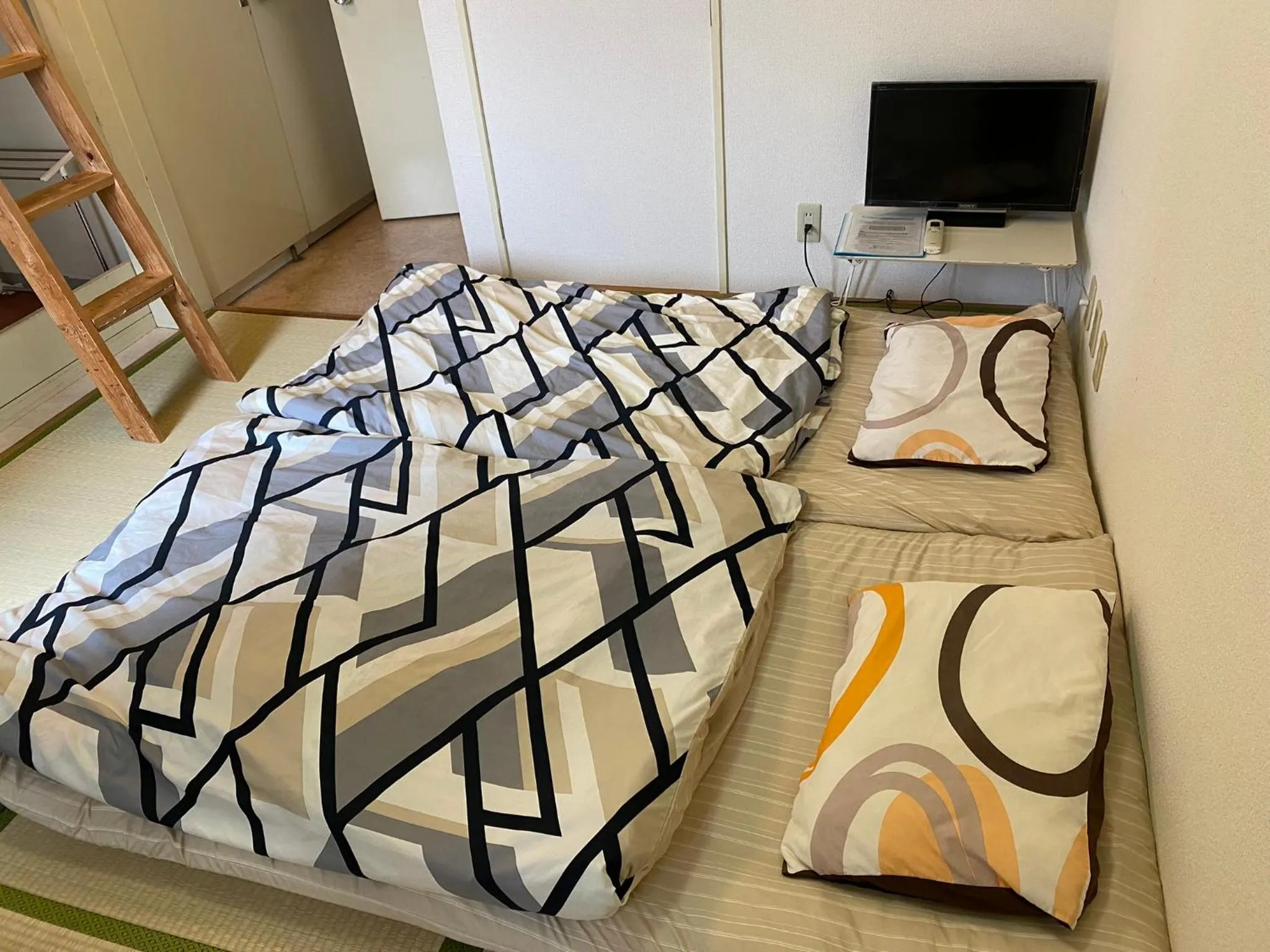 Bed in Palette Takashimadaira guest house