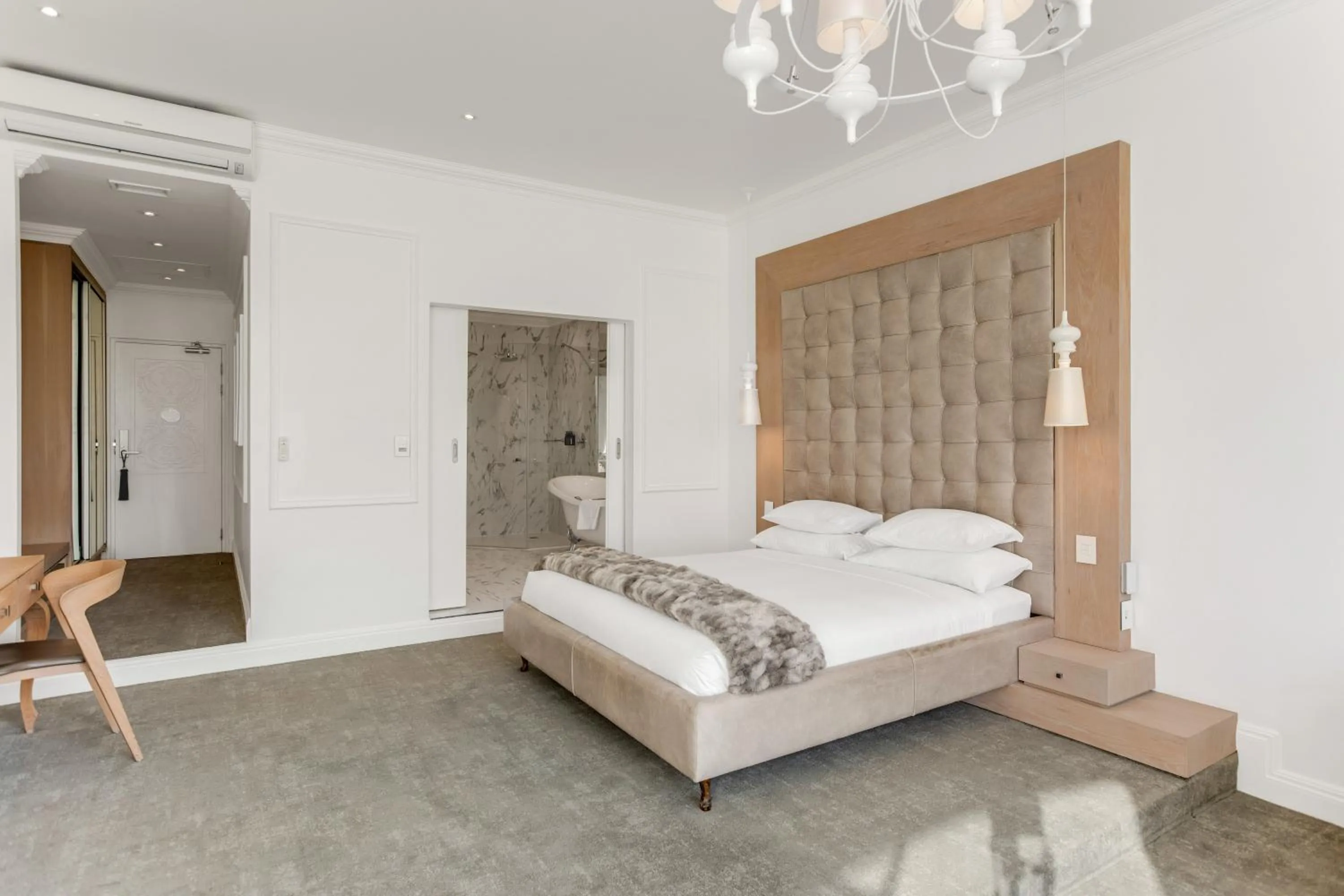 Bed in The Marly Boutique Hotel