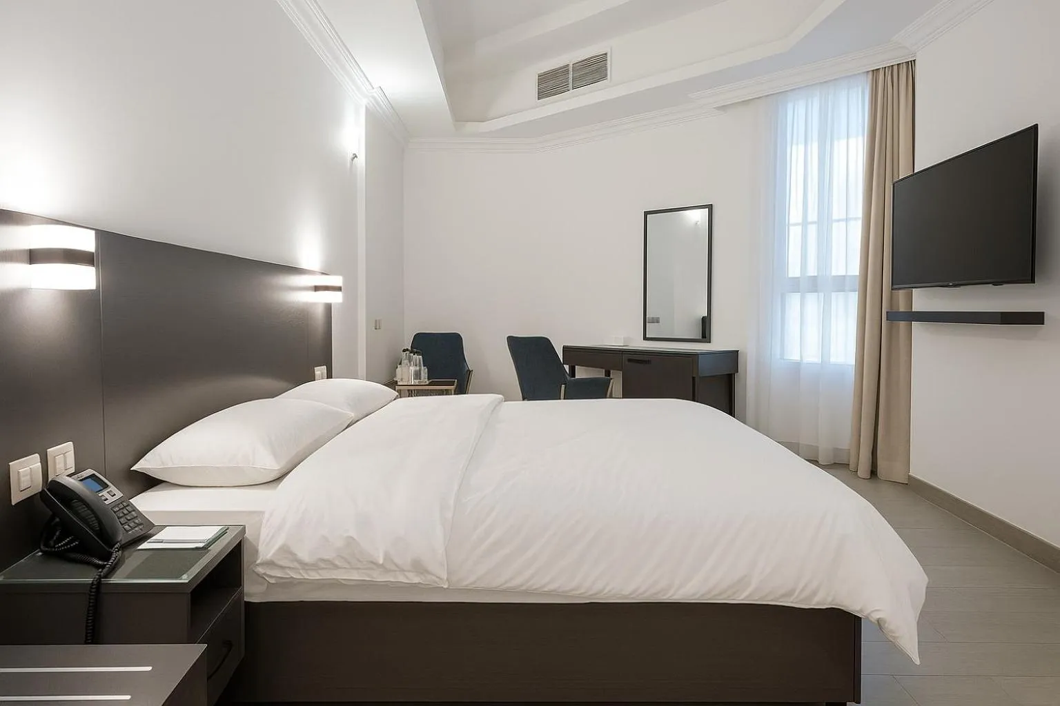 Bed in Garden City Hotel Dubai