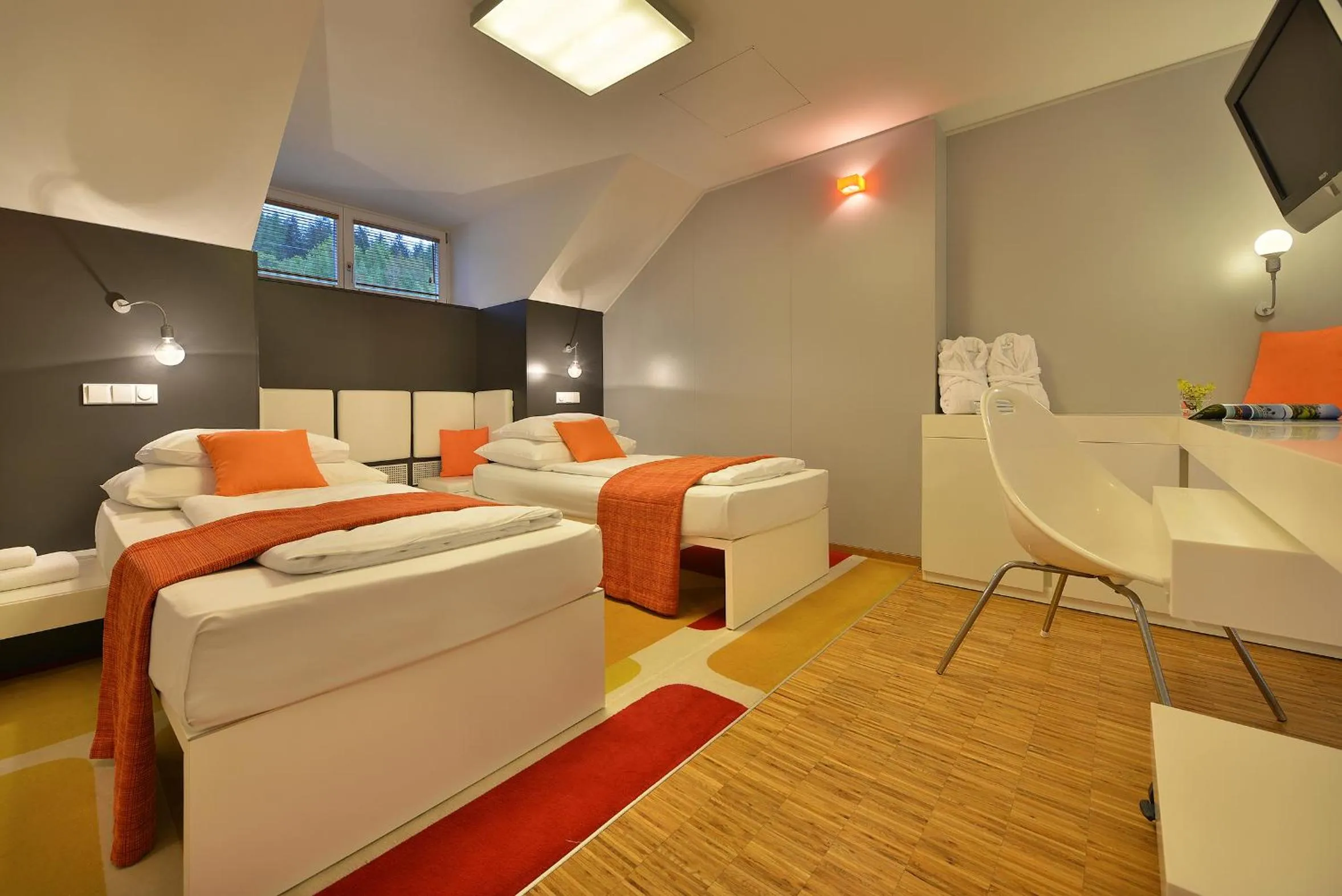 Bed in Omnia Hotel Relax & Wellness