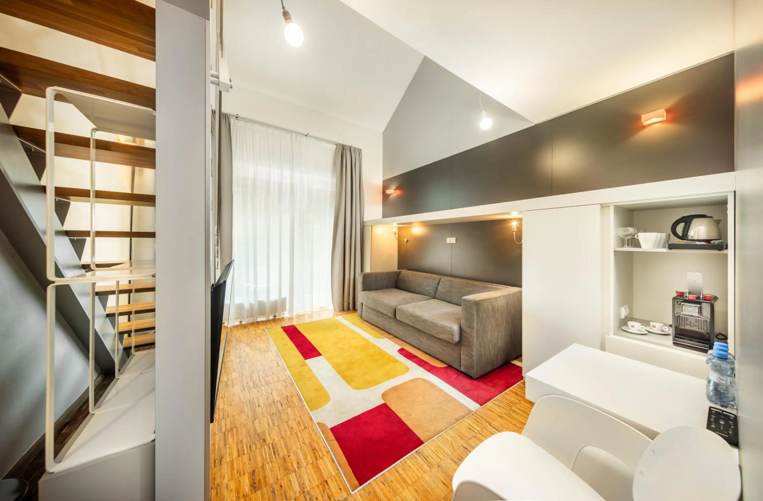 Living room, Bed in Omnia Hotel Relax & Wellness