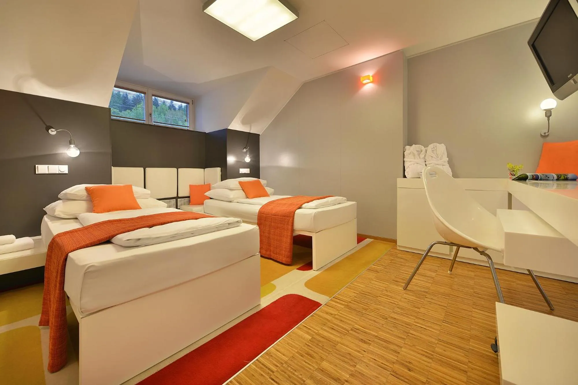 Bed in Omnia Hotel Relax & Wellness