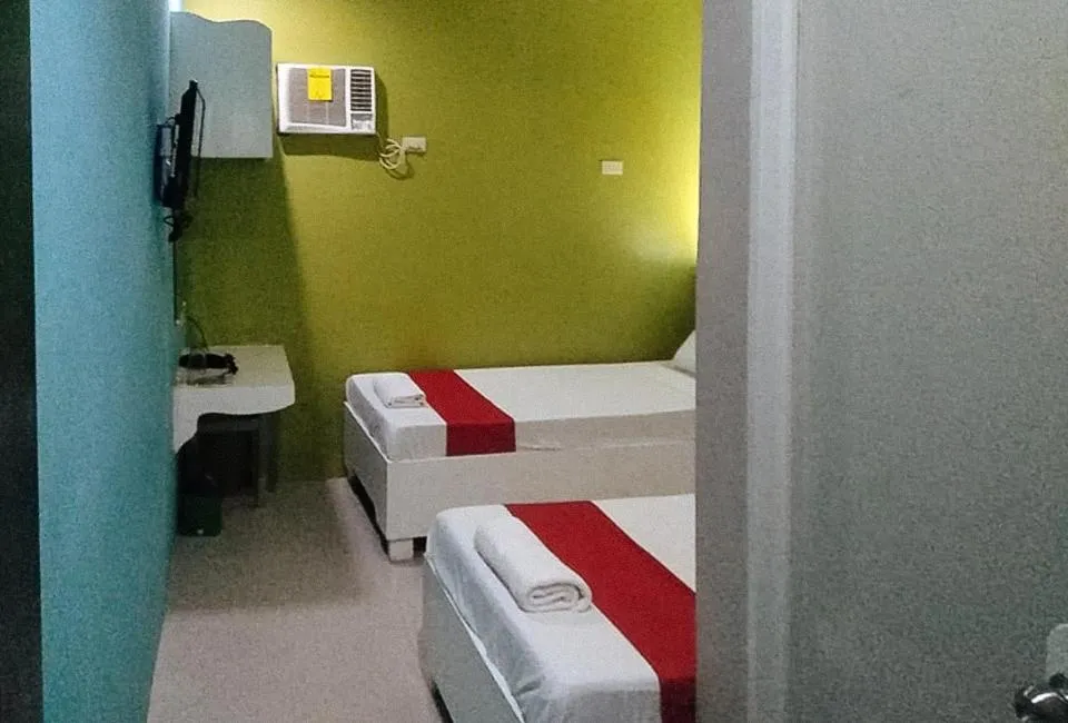Bed in RedDoorz at EM Pensiontel Butuan City