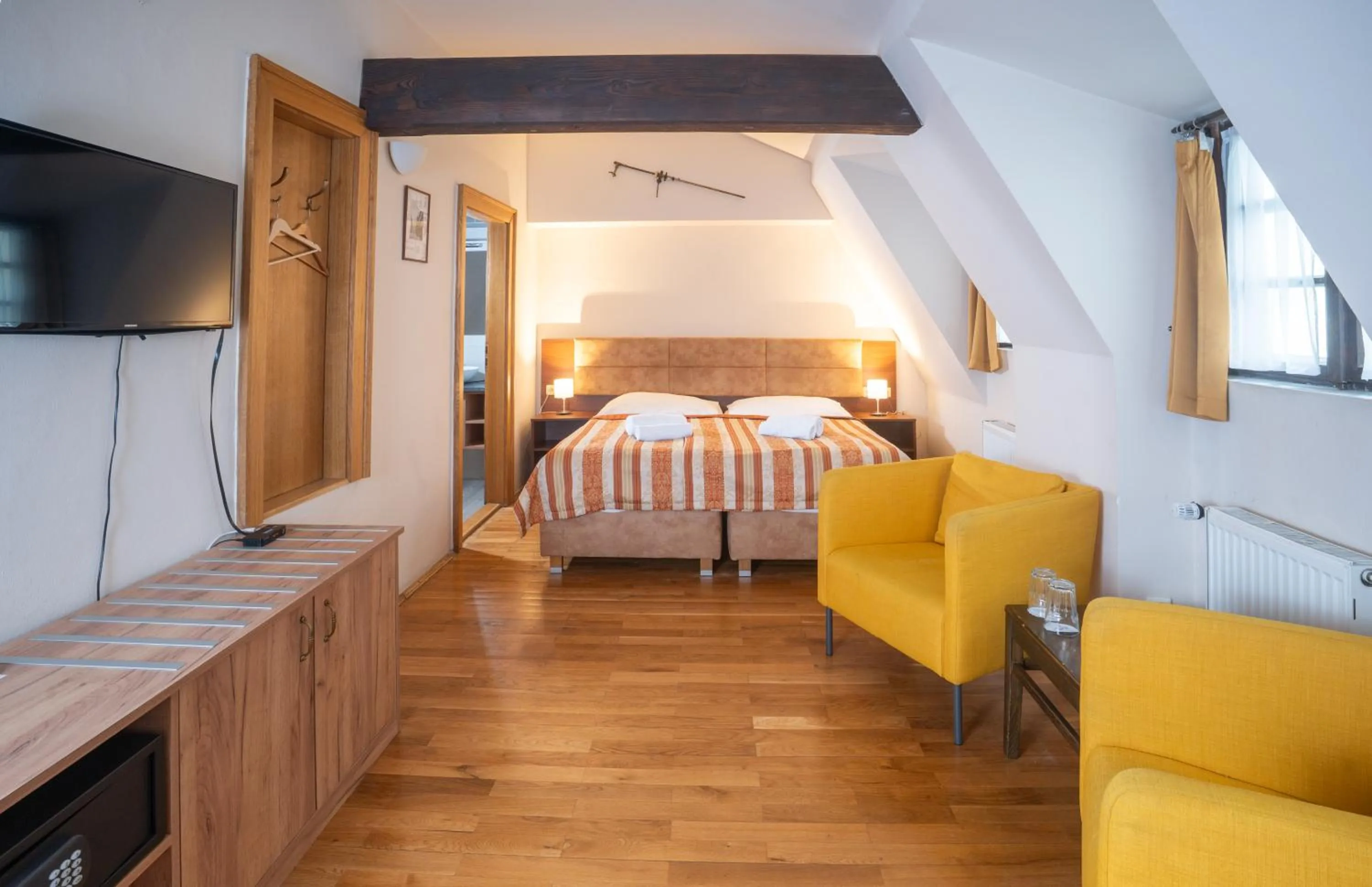 Bedroom, Bed in U Medvidku-Brewery Hotel