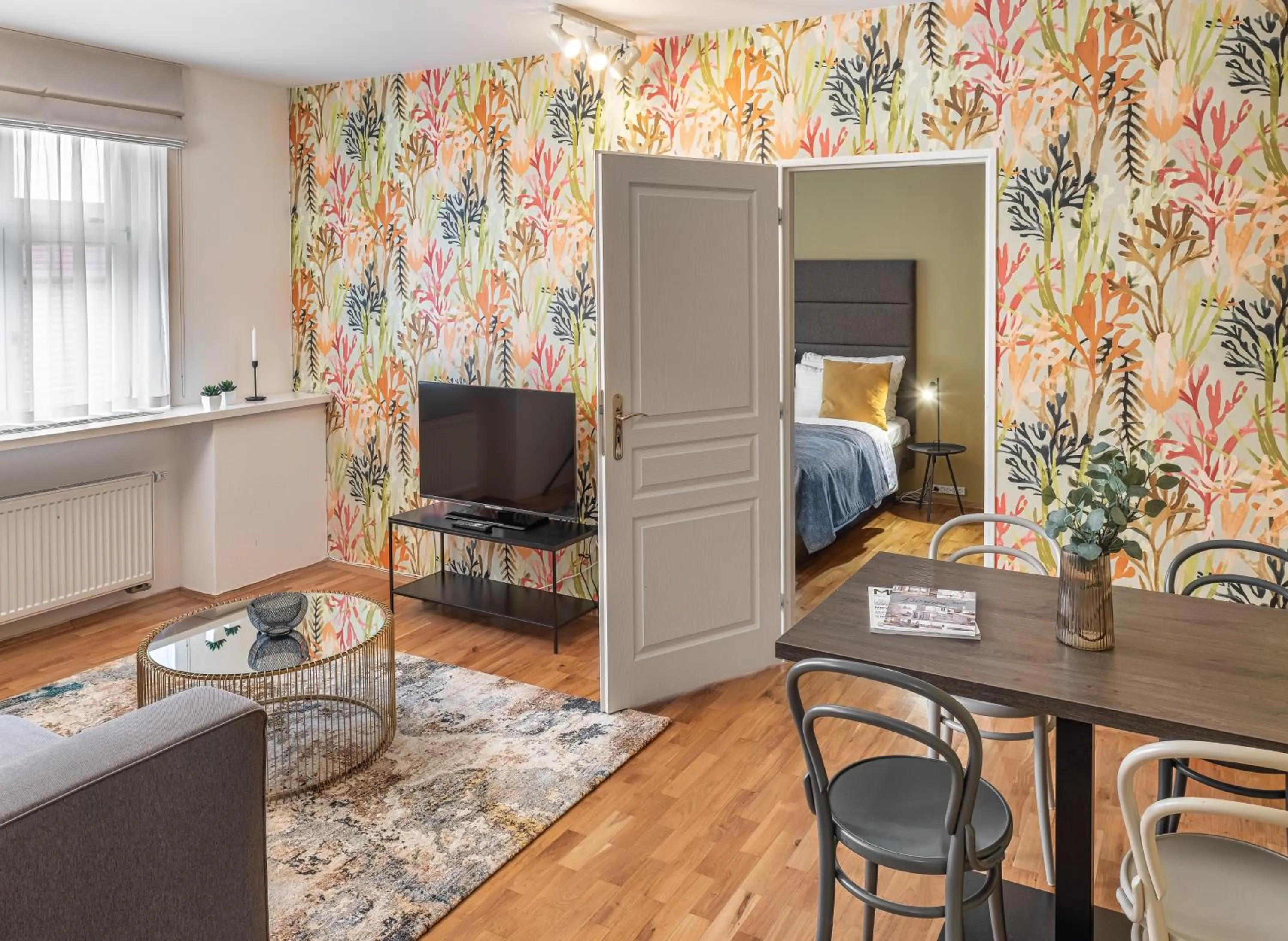 TV and multimedia, Bed in VN48 Suites by Adrez