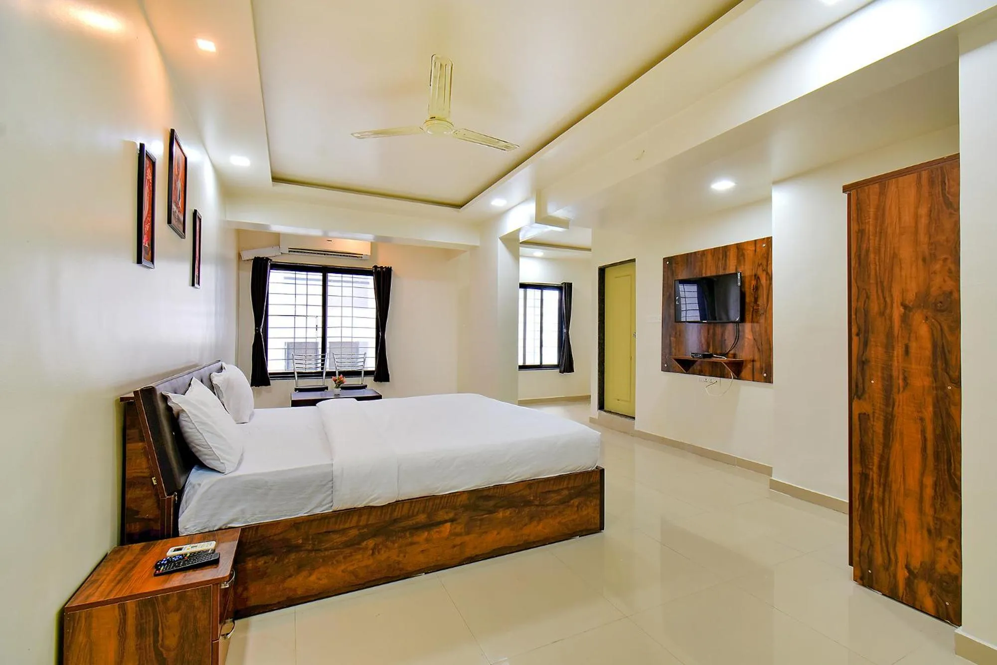 Bed in FabHotel White House - Nr Sinhagad speciality Hospital