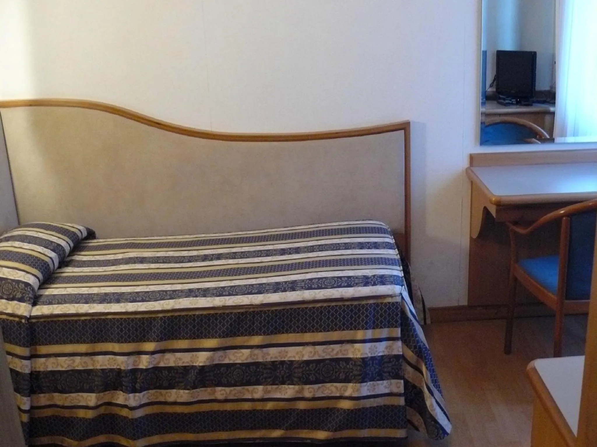 Photo of the whole room, Bed in Albergo Milano