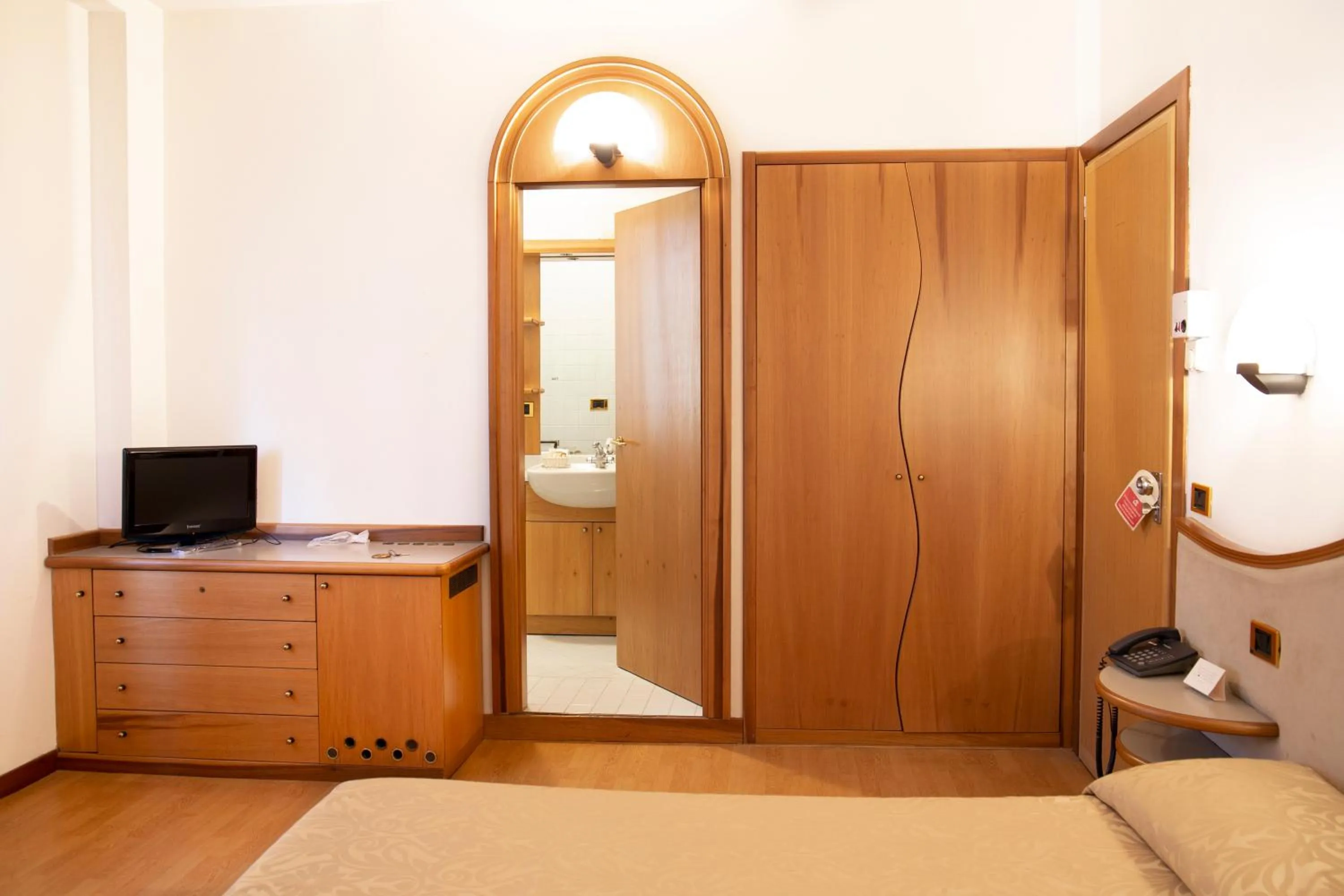 Bed in Albergo Milano