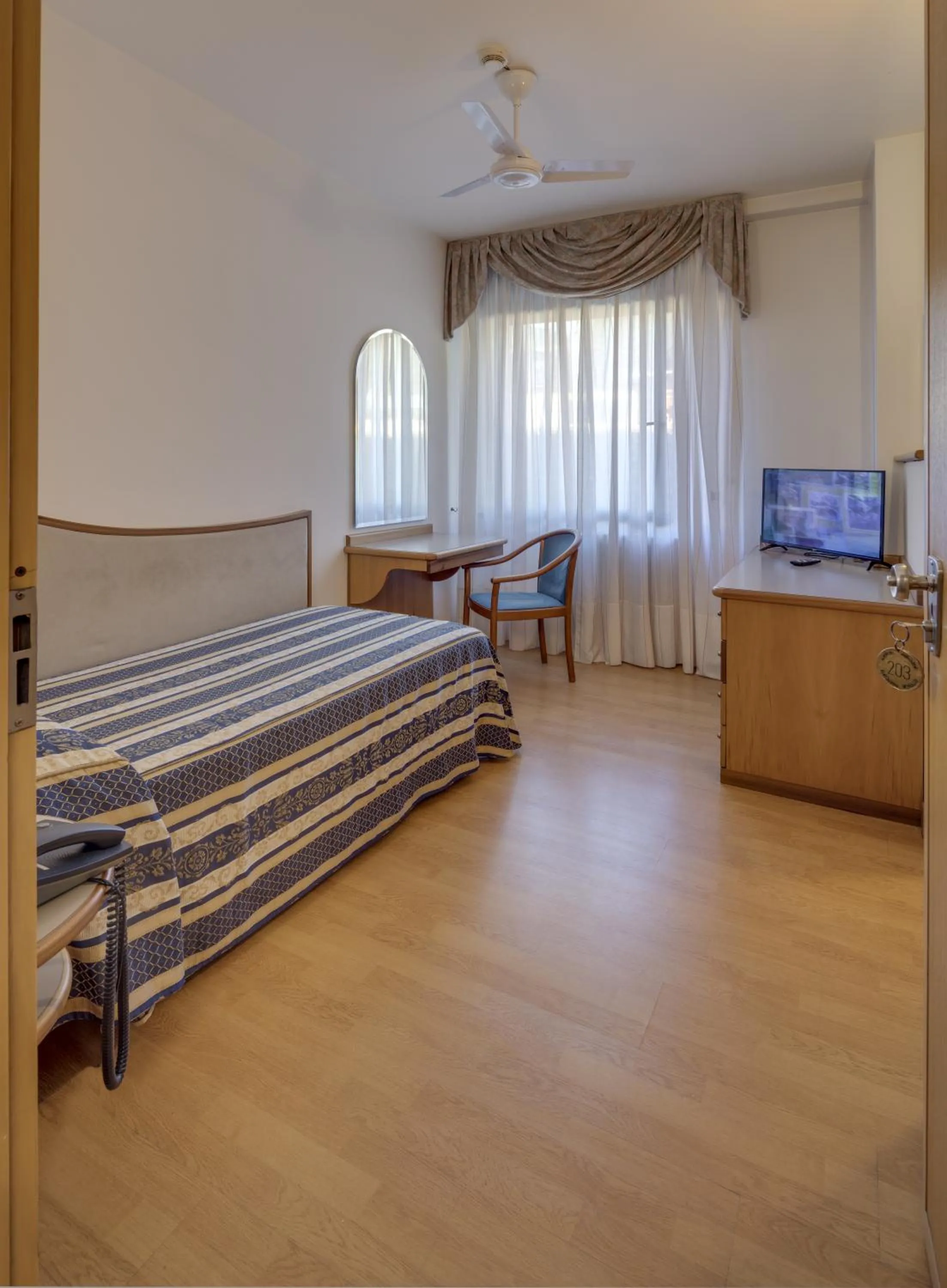 Bed in Albergo Milano