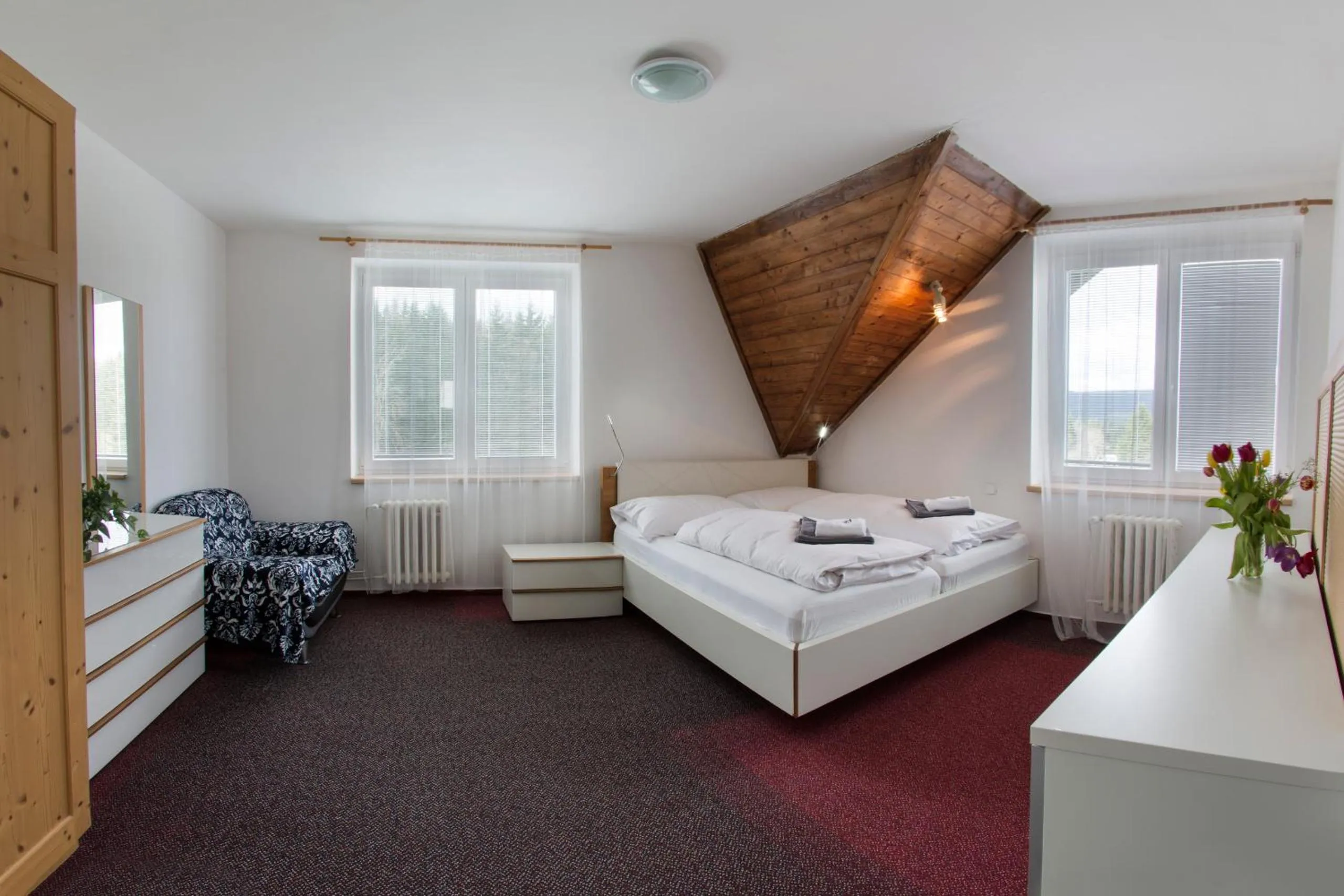 Bed in Hotel Harrachov Inn