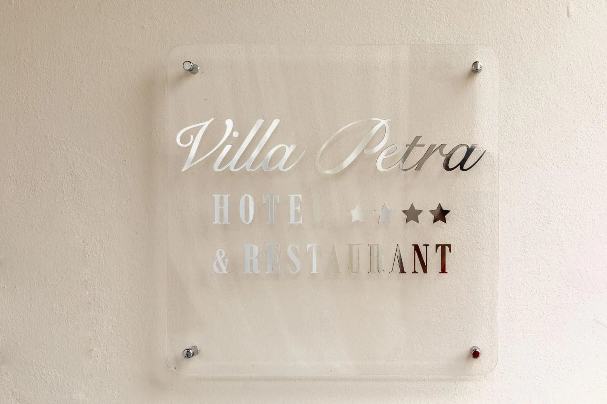 Property logo or sign in Villa Petra