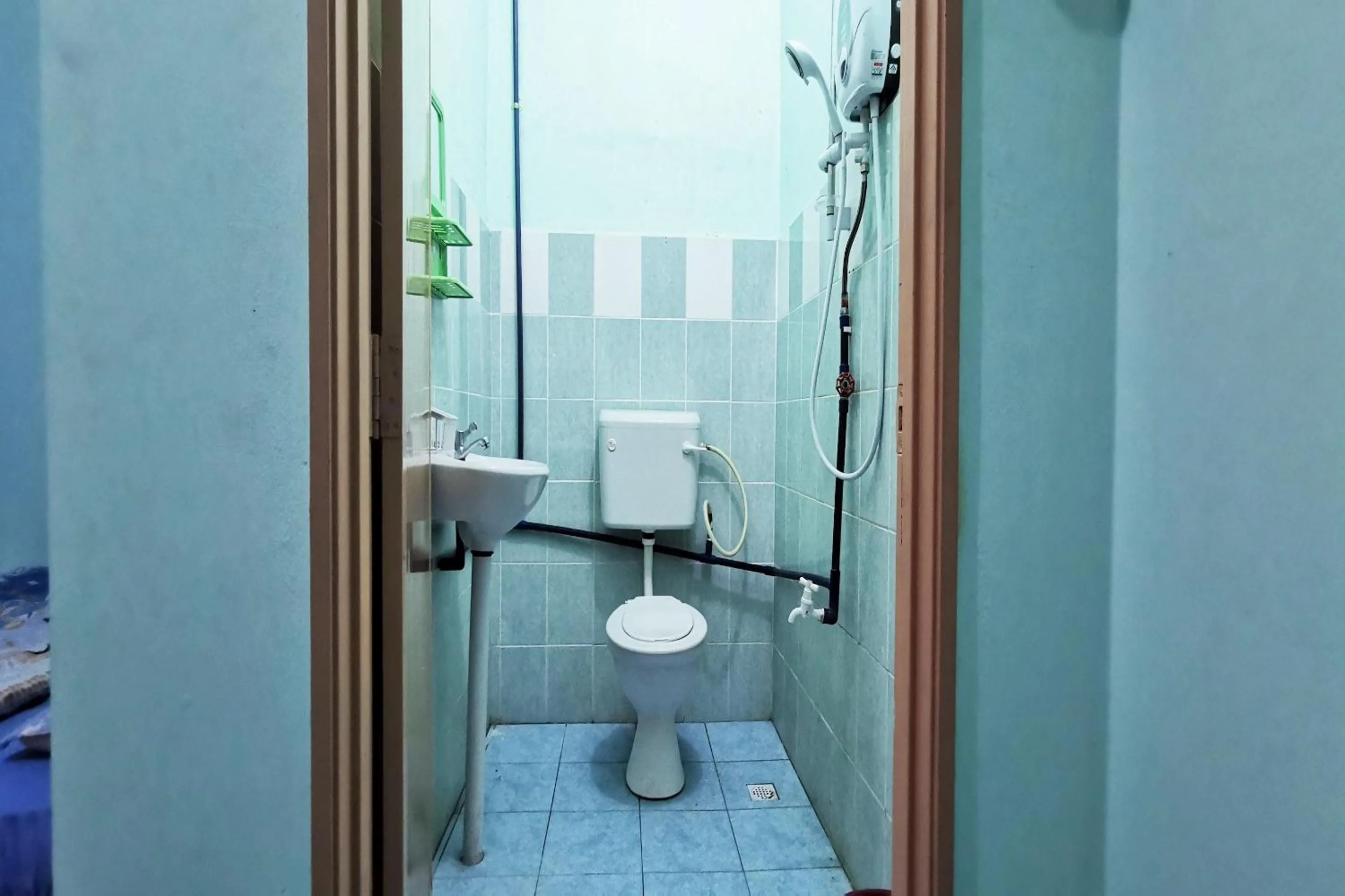 Bathroom in Hotel O Sosodikon Inap Desa