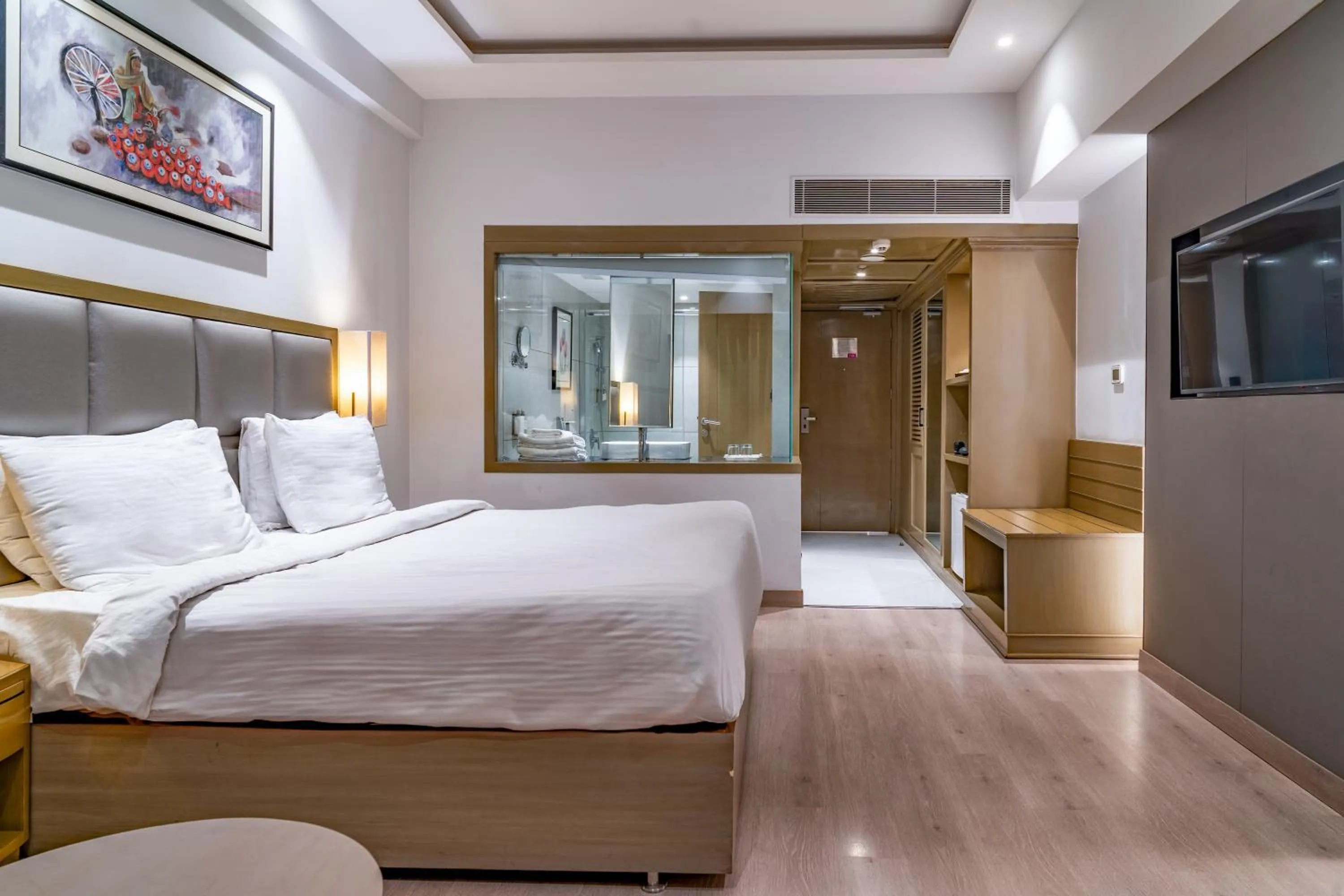 Photo of the whole room, Bed in Regenta Place Amritsar by Royal Orchid Hotels Limited