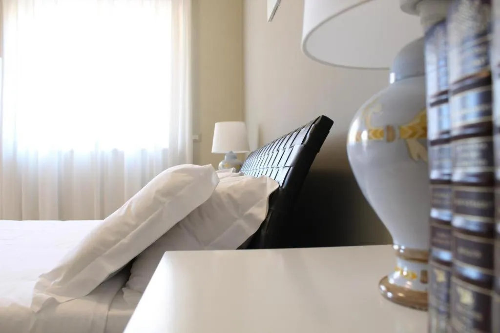 Bed in Colonna Rooms & apartment