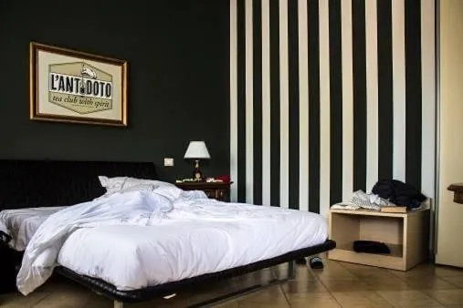 Bed in Colonna Rooms & apartment