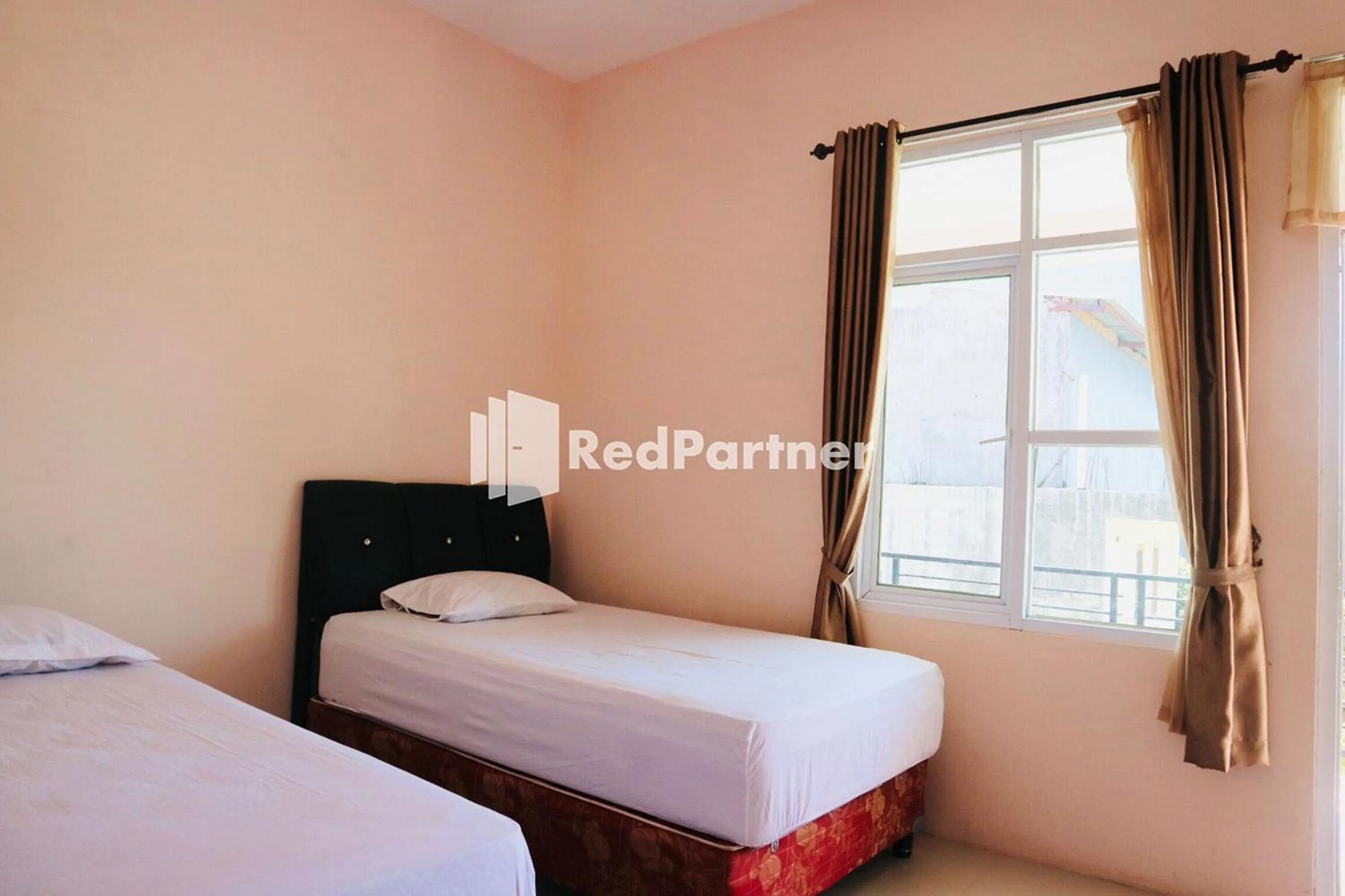 Bed in Wisma Suci Syariah Polewali Mandar Mitra RedDoorz