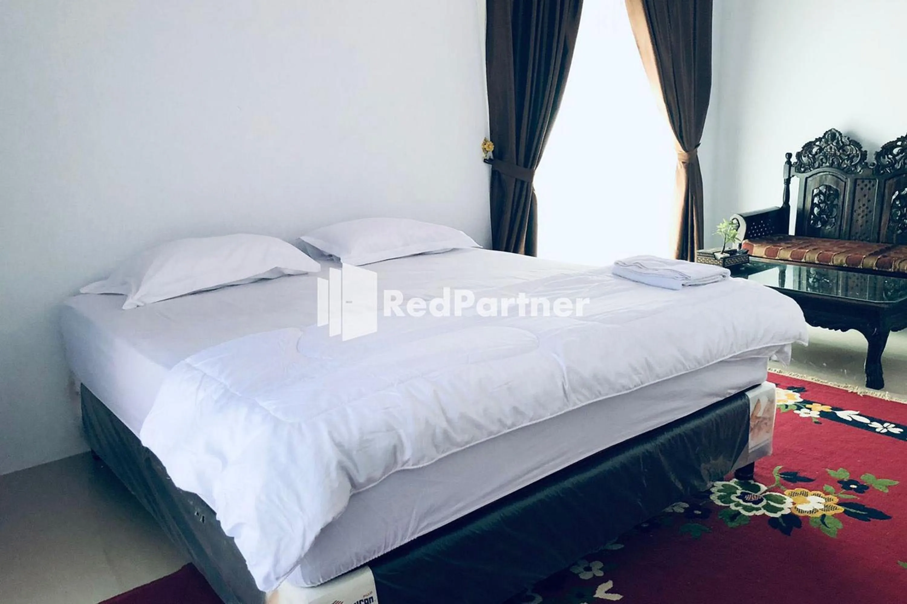 Bed in Wisma Suci Syariah Polewali Mandar Mitra RedDoorz