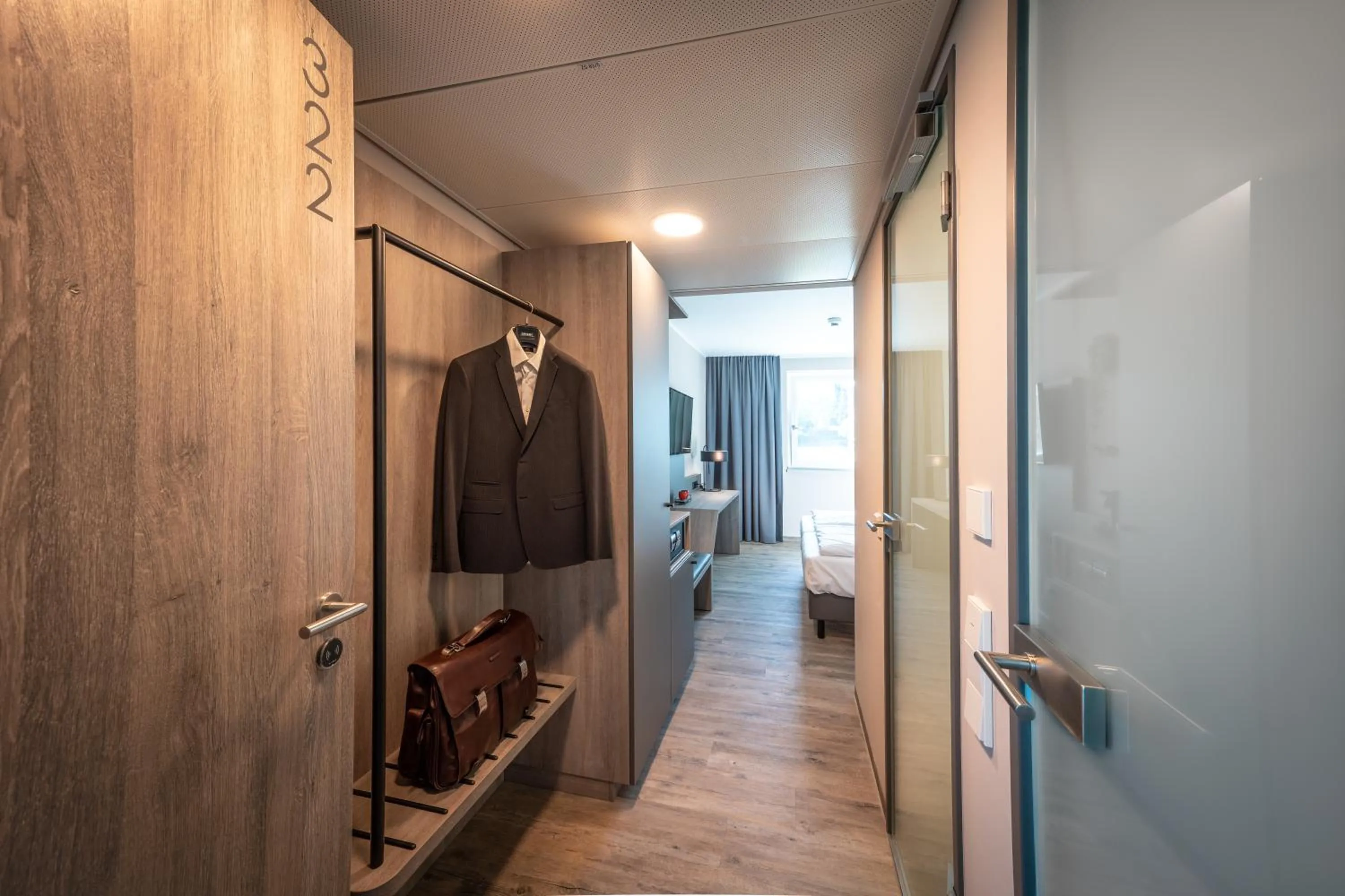 Bedroom in LOGINN Hotel Stuttgart Zuffenhausen