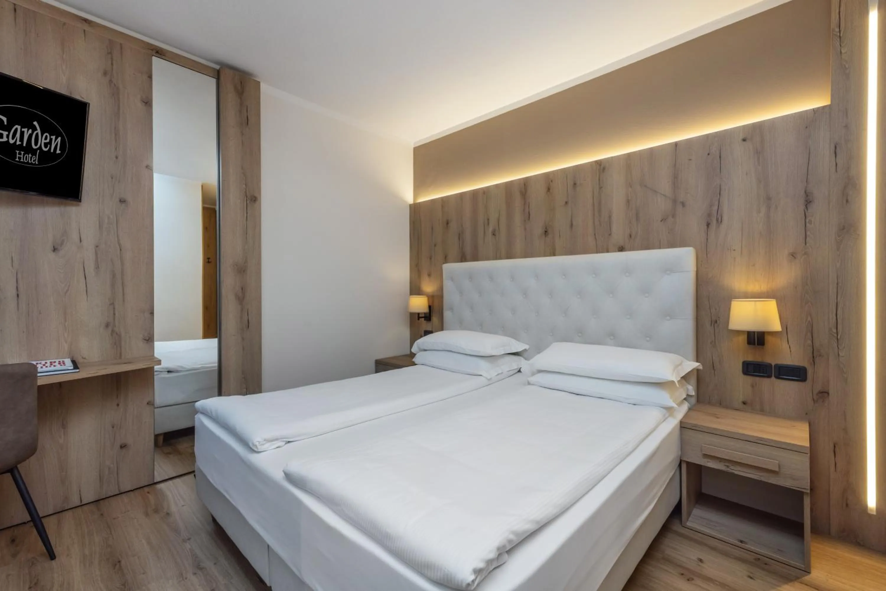 Bed in Garden Wellness Hotel S