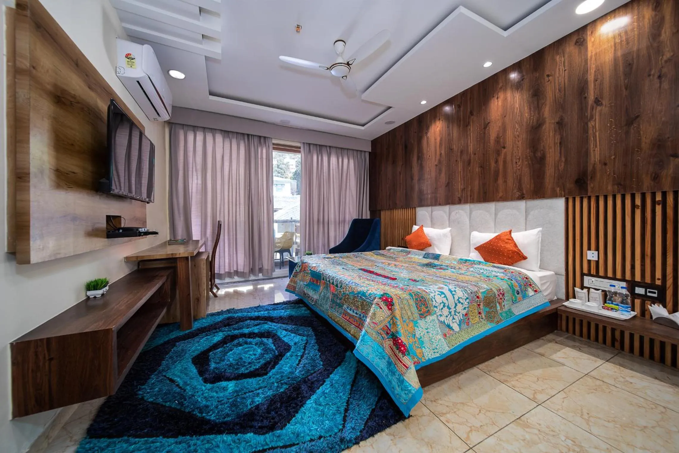 Bed in Tripli Hotels Shivaay