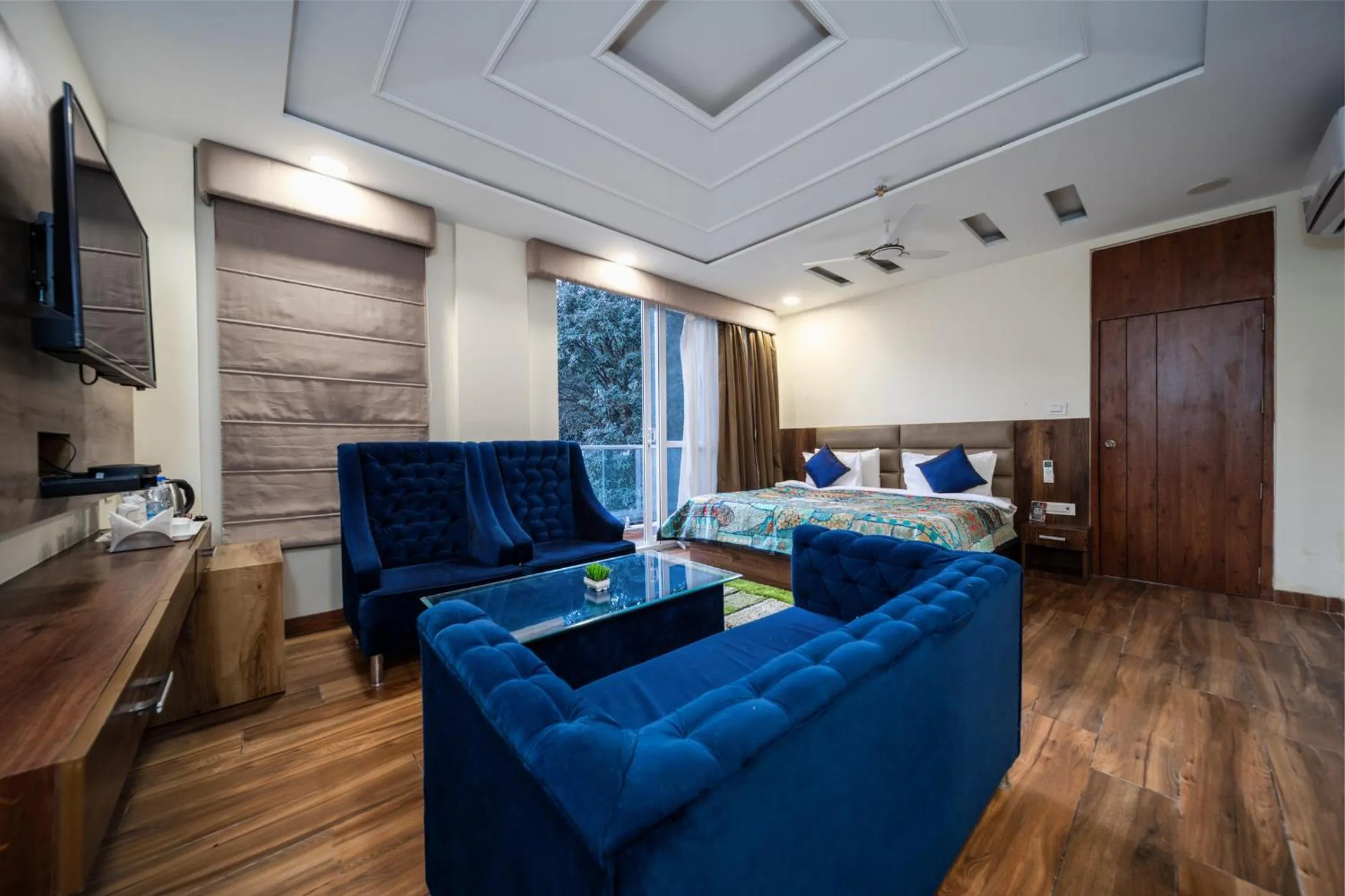 Bed in Tripli Hotels Shivaay