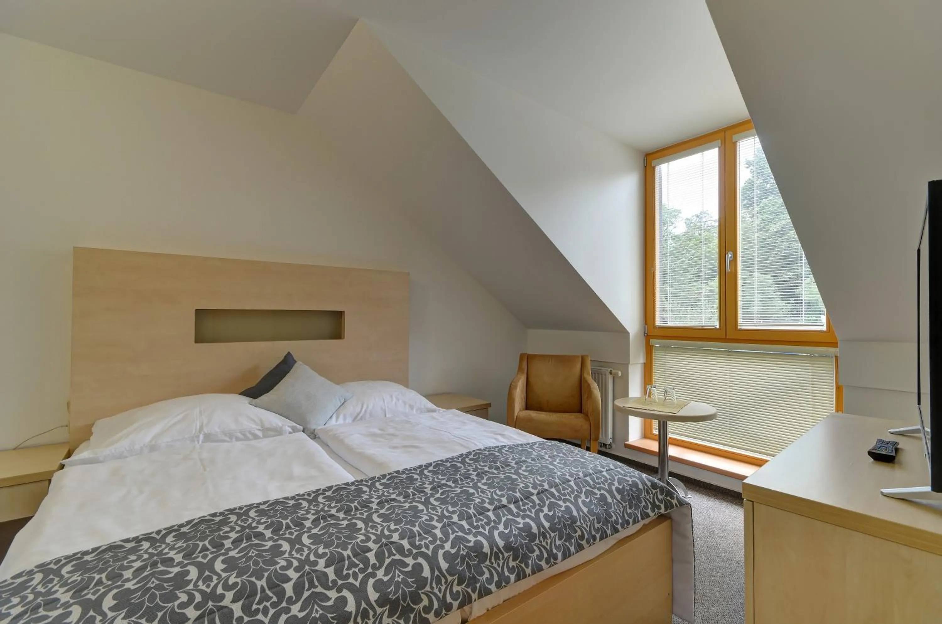 Bed in Hotel U Pramenu