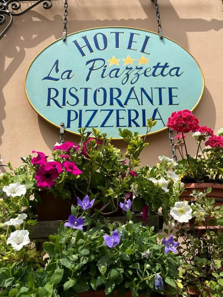Property logo or sign in Hotel La Piazzetta