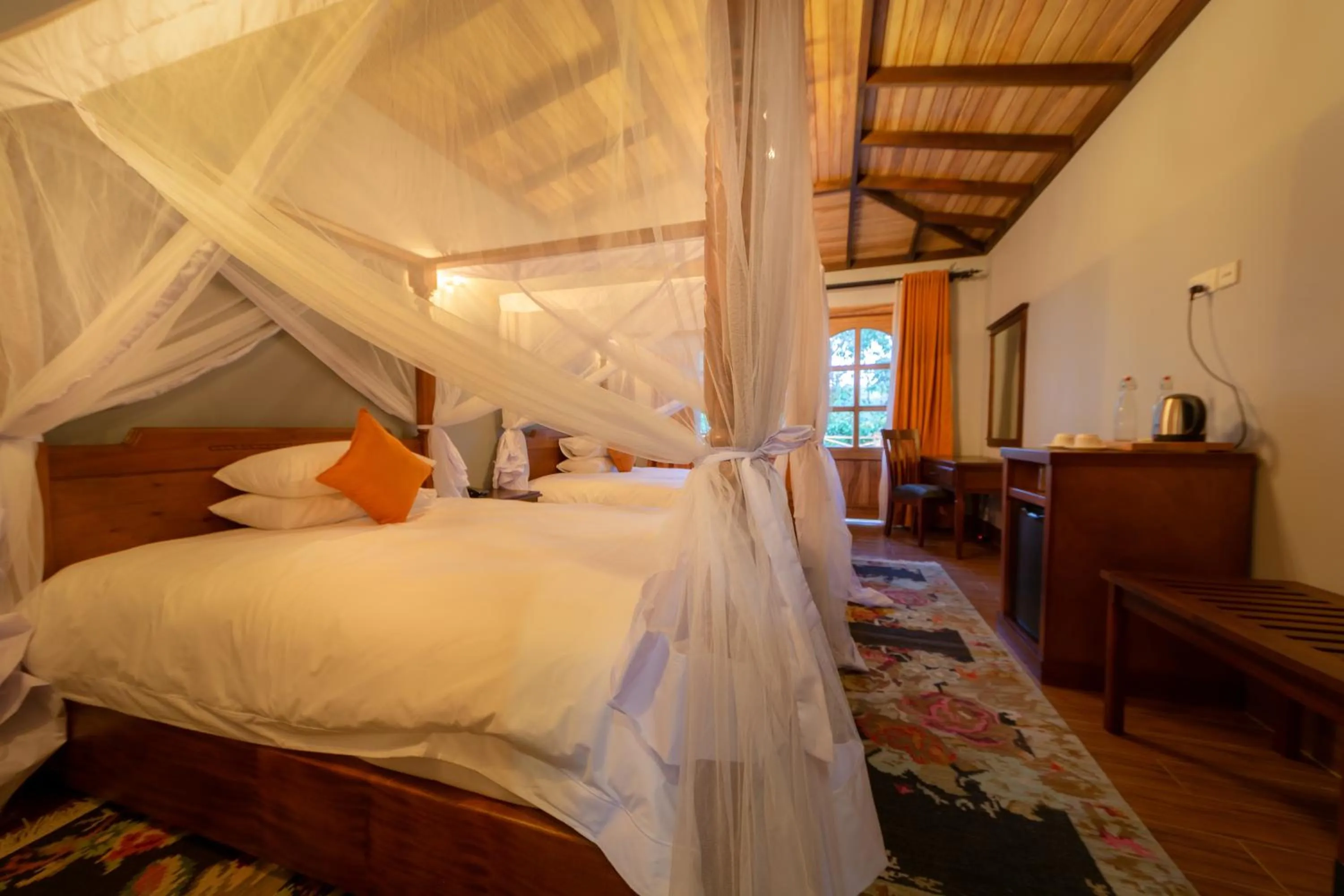 Bed in Chimpundu Lodge