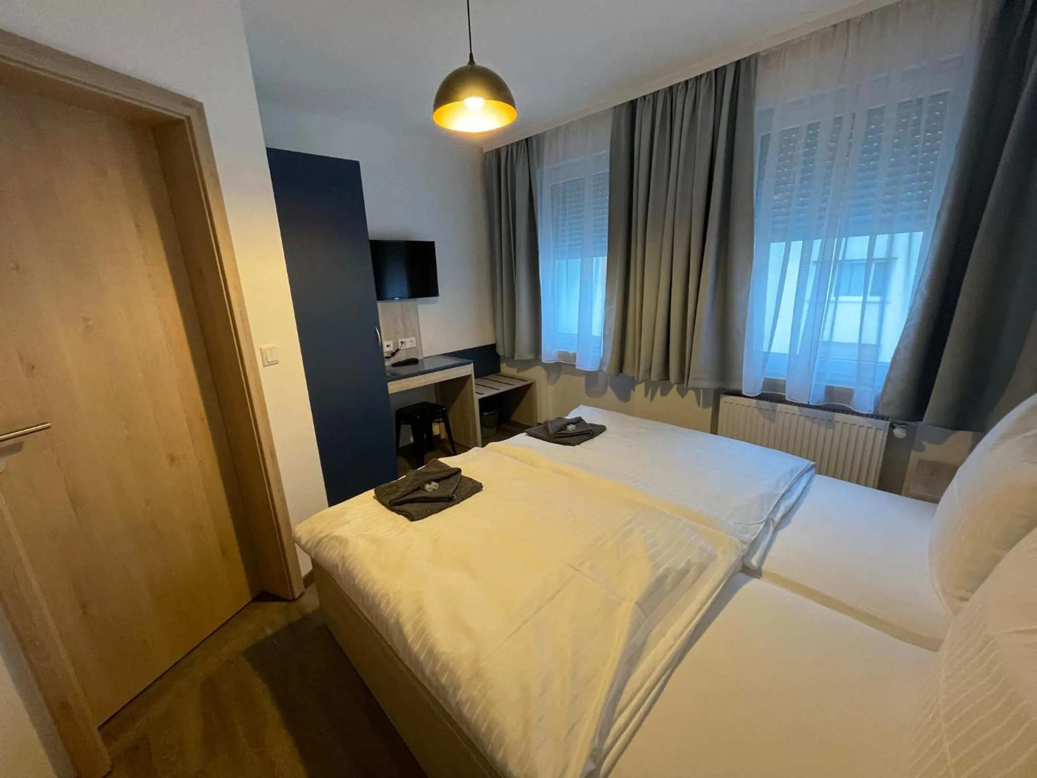 Photo of the whole room, Bed in Hotel Central City Hbf Nürnberg Garni